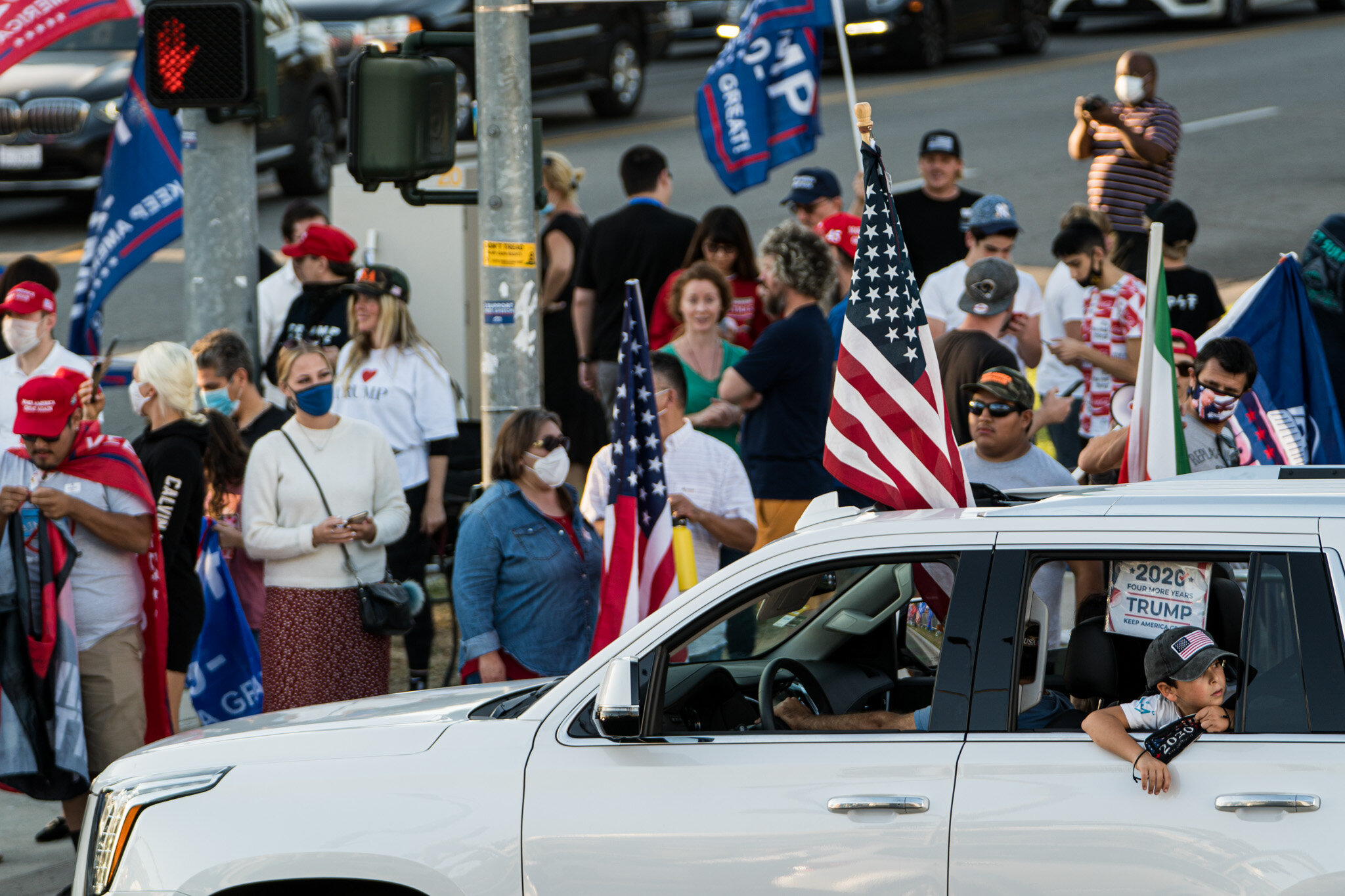  With just over twenty-four hours until election day, Trump supporters assembled in Beverly Hills, California on 11/1/2020. The group stationed themselves on Santa Monica Boulevard, and then proceeded to march down Beverly Blvd. and Rodeo Drive to sh