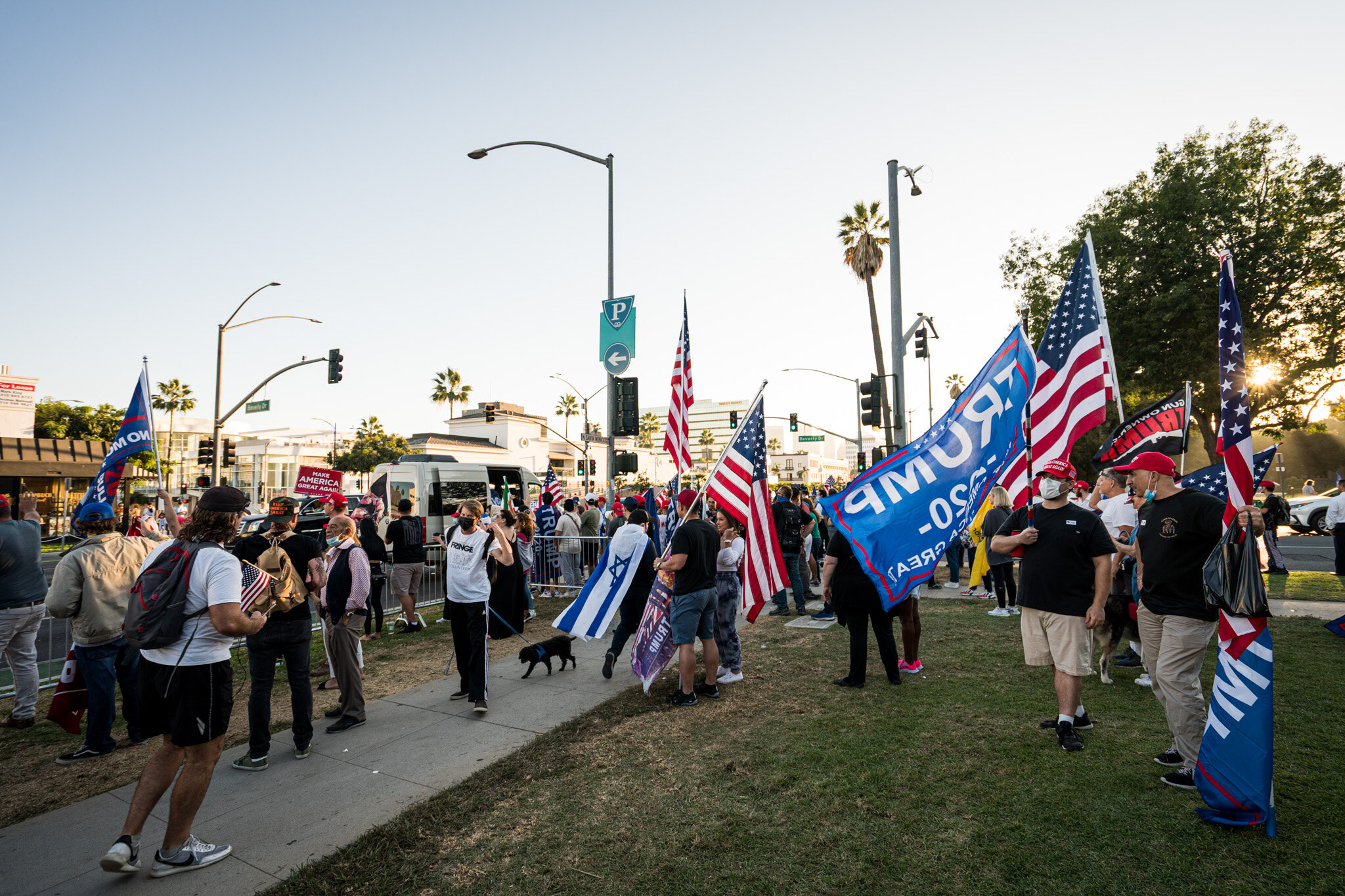  With just over twenty-four hours until election day, Trump supporters assembled in Beverly Hills, California on 11/1/2020. The group stationed themselves on Santa Monica Boulevard, and then proceeded to march down Beverly Blvd. and Rodeo Drive to sh