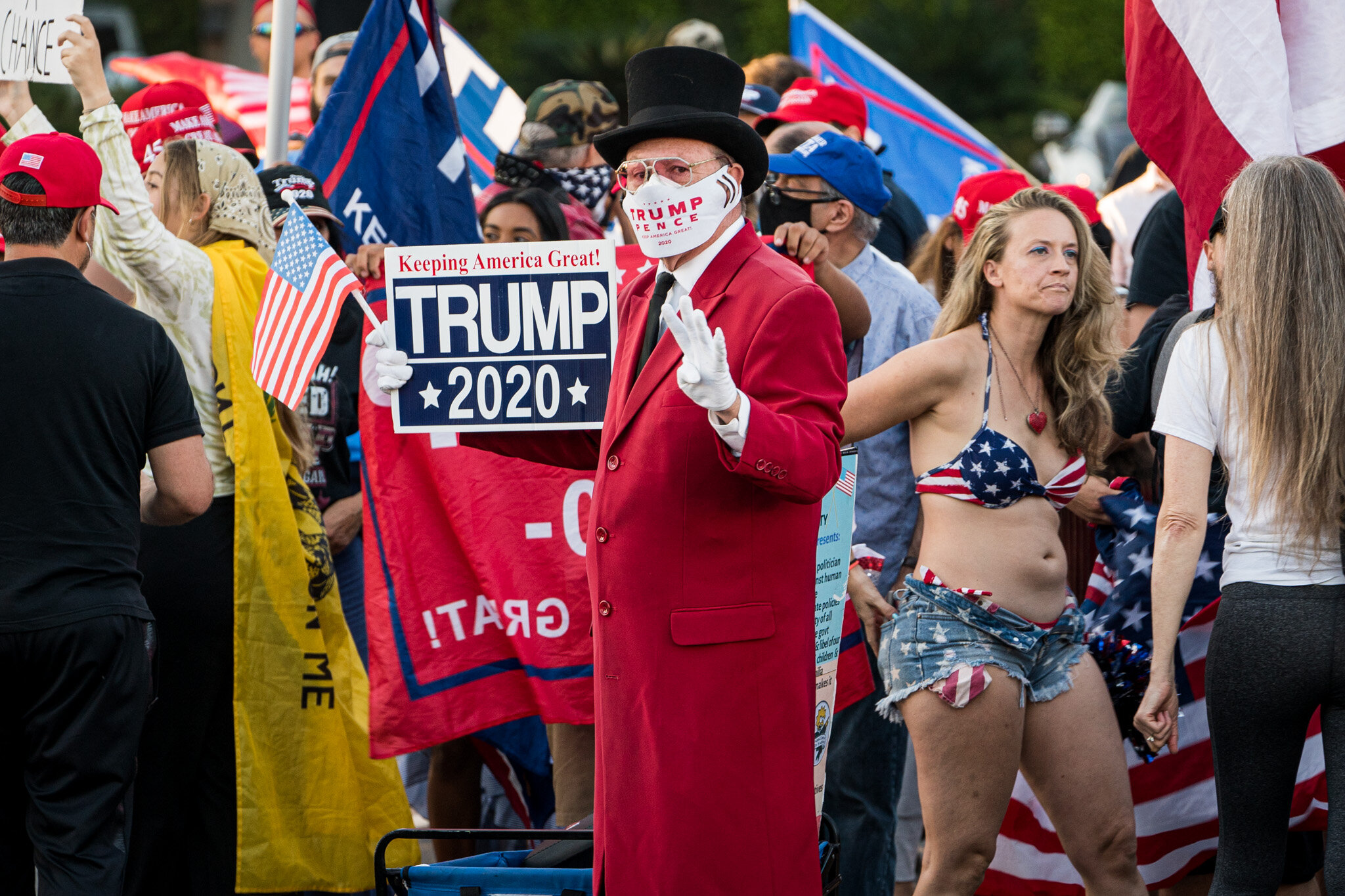  With just over twenty-four hours until election day, Trump supporters assembled in Beverly Hills, California on 11/1/2020. The group stationed themselves on Santa Monica Boulevard, and then proceeded to march down Beverly Blvd. and Rodeo Drive to sh