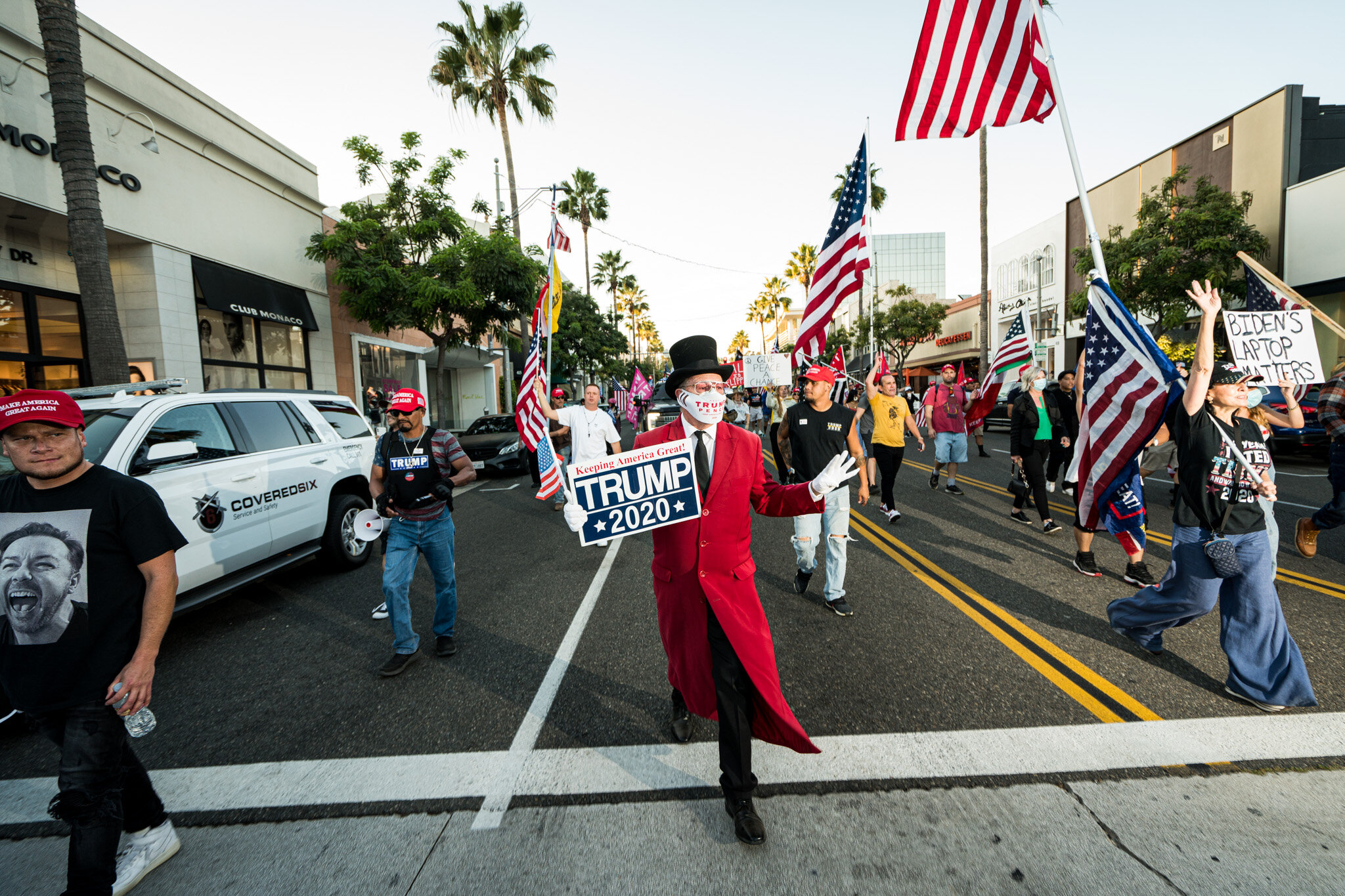  With just over twenty-four hours until election day, Trump supporters assembled in Beverly Hills, California on 11/1/2020. The group stationed themselves on Santa Monica Boulevard, and then proceeded to march down Beverly Blvd. and Rodeo Drive to sh