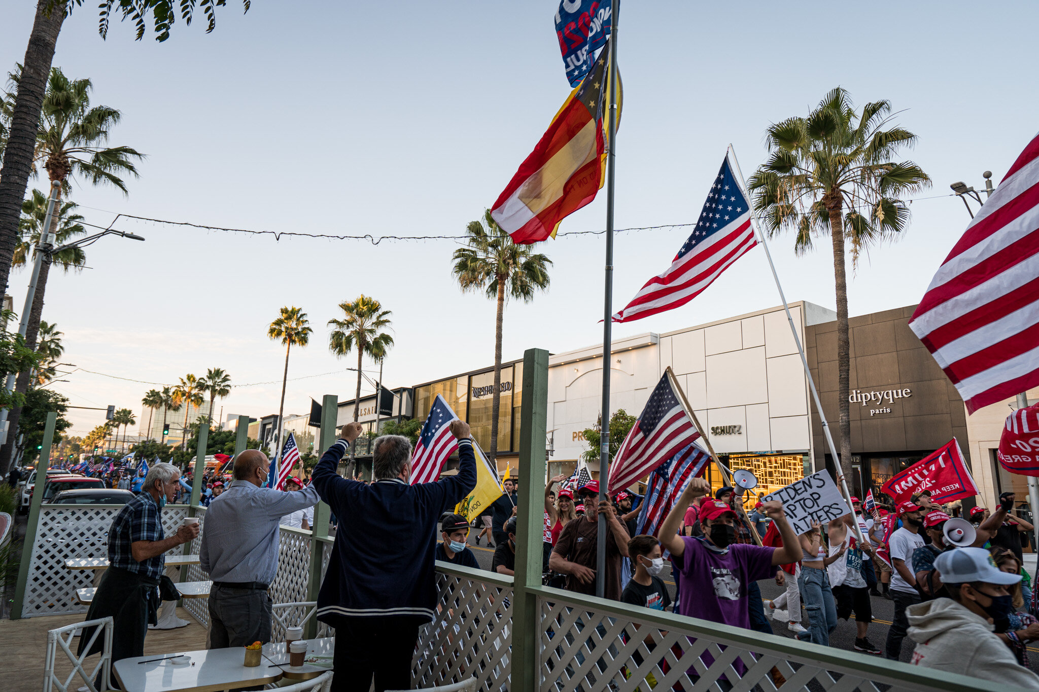  With just over twenty-four hours until election day, Trump supporters assembled in Beverly Hills, California on 11/1/2020. The group stationed themselves on Santa Monica Boulevard, and then proceeded to march down Beverly Blvd. and Rodeo Drive to sh