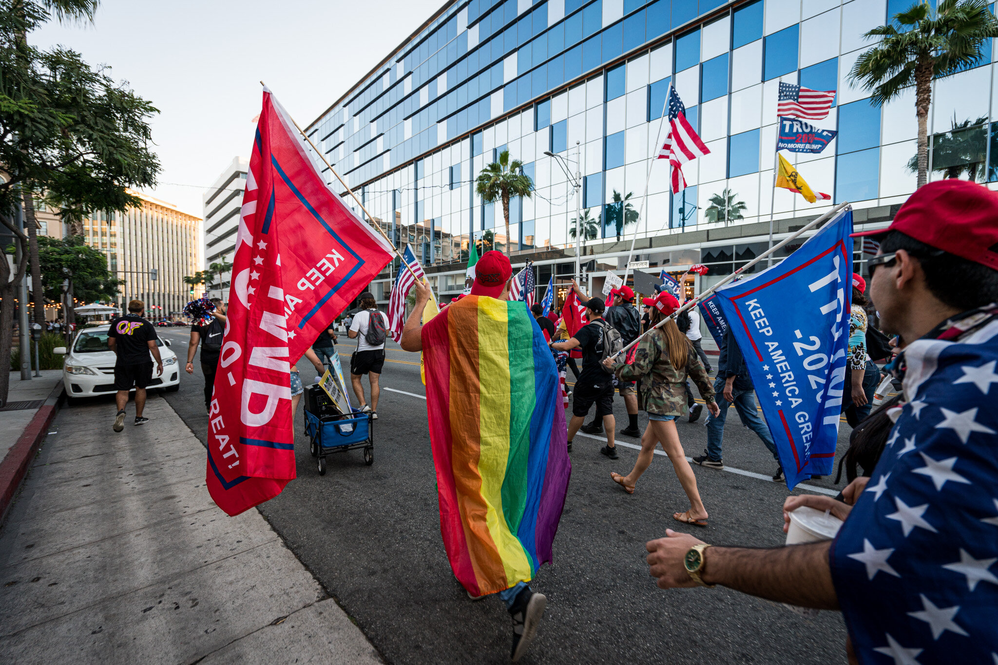  With just over twenty-four hours until election day, Trump supporters assembled in Beverly Hills, California on 11/1/2020. The group stationed themselves on Santa Monica Boulevard, and then proceeded to march down Beverly Blvd. and Rodeo Drive to sh