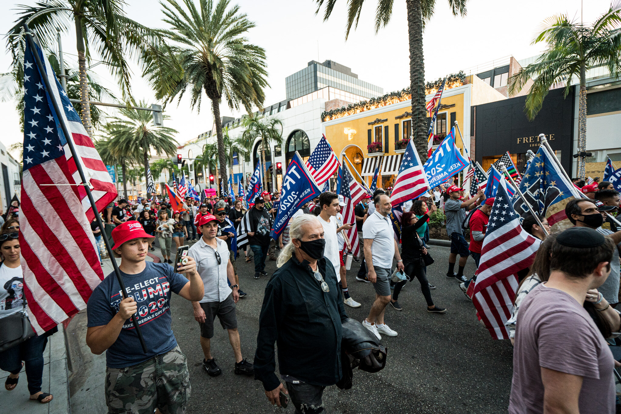  With just over twenty-four hours until election day, Trump supporters assembled in Beverly Hills, California on 11/1/2020. The group stationed themselves on Santa Monica Boulevard, and then proceeded to march down Beverly Blvd. and Rodeo Drive to sh