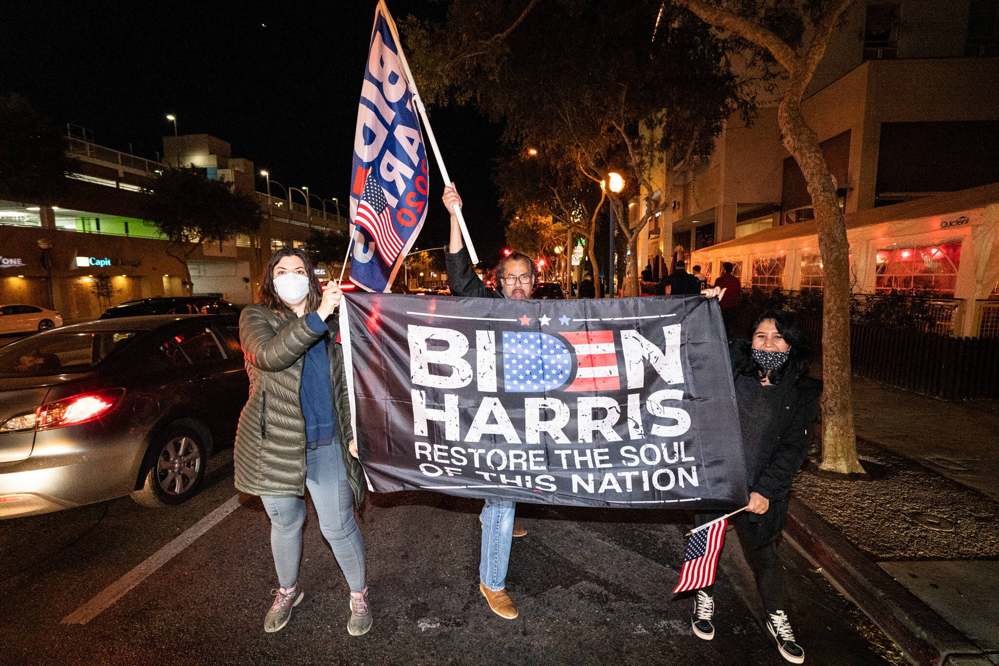  Angelenos take to the streets in West Hollywood, California, to celebrate the 2020 Presidential Election Results on November 7, 2020. 