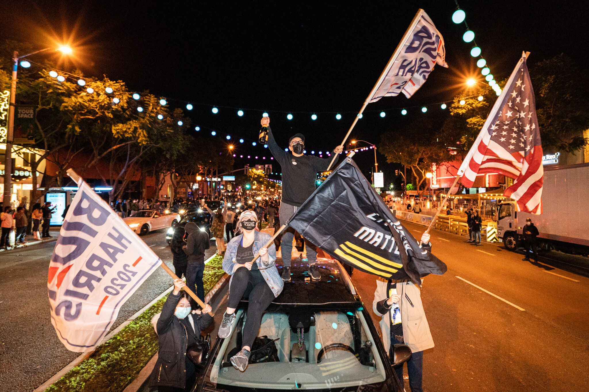  Angelenos take to the streets in West Hollywood, California, to celebrate the 2020 Presidential Election Results on November 7, 2020. 