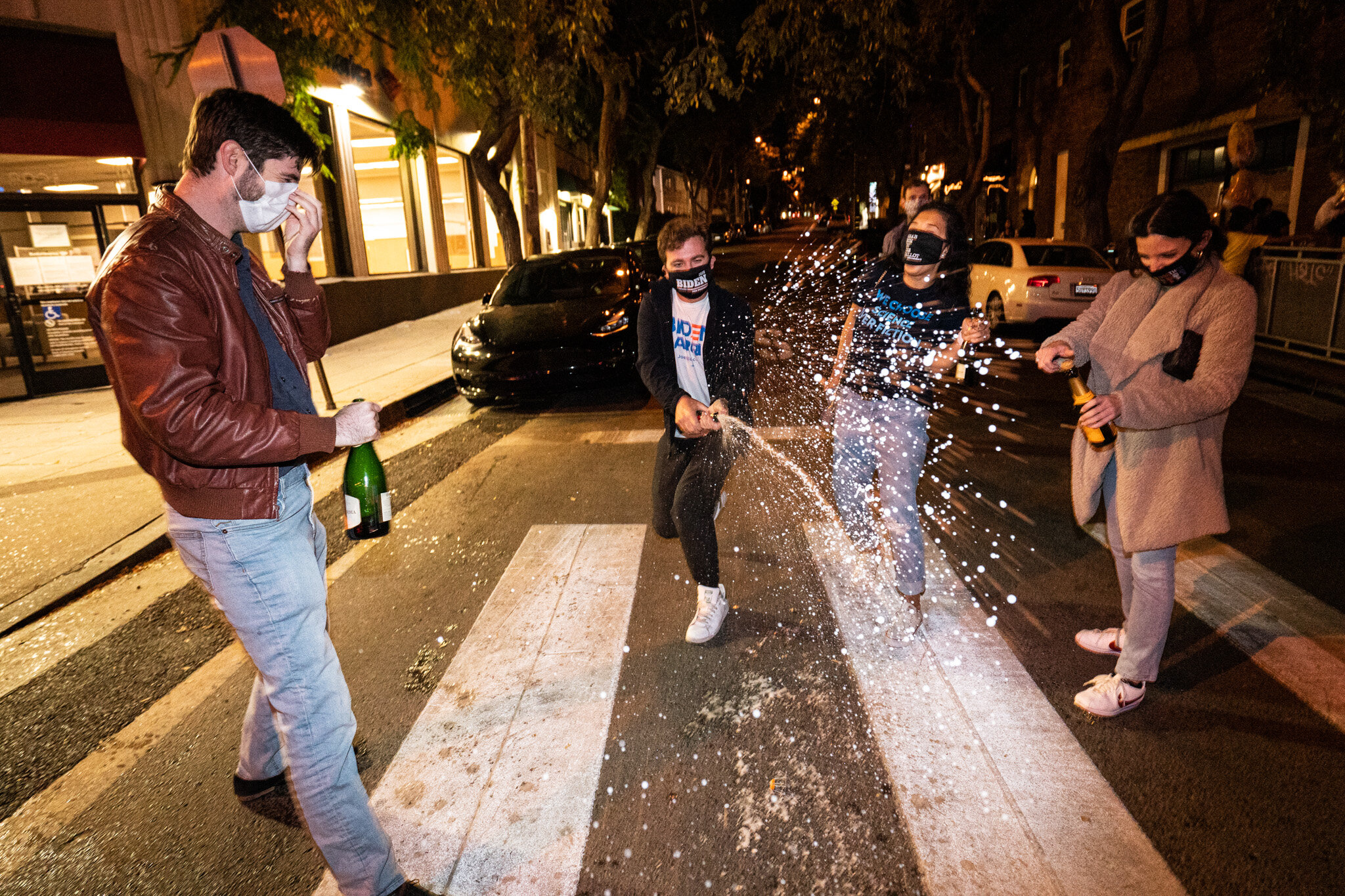  Angelenos take to the streets in West Hollywood, California, to celebrate the 2020 Presidential Election Results on November 7, 2020. 