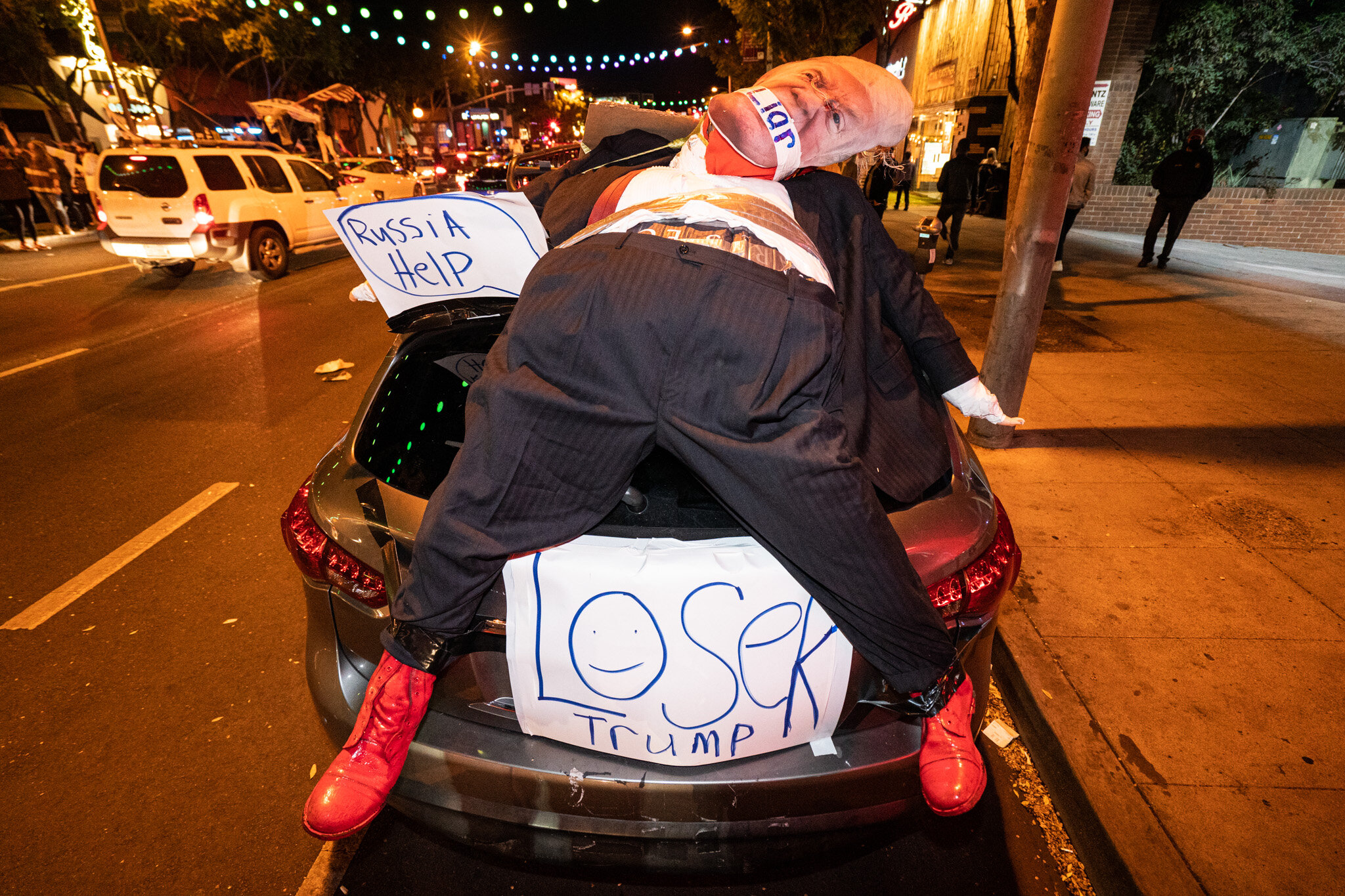  Angelenos take to the streets in West Hollywood, California, to celebrate the 2020 Presidential Election Results on November 7, 2020. 