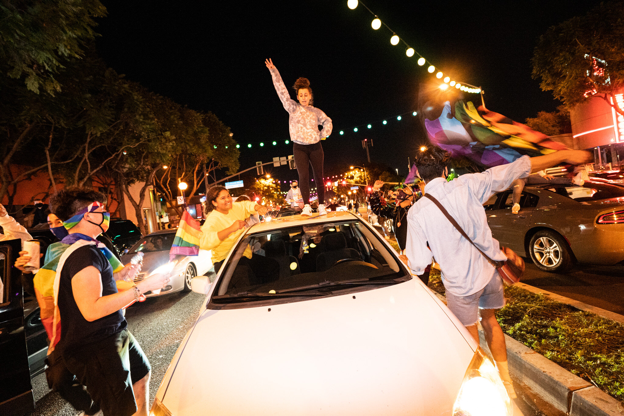  Angelenos take to the streets in West Hollywood, California, to celebrate the 2020 Presidential Election Results on November 7, 2020. 