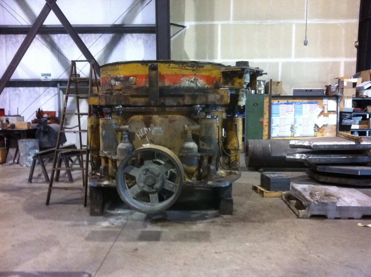 Complete tear down and rebuild of a rock crusher including hard facing and machining of wear parts.