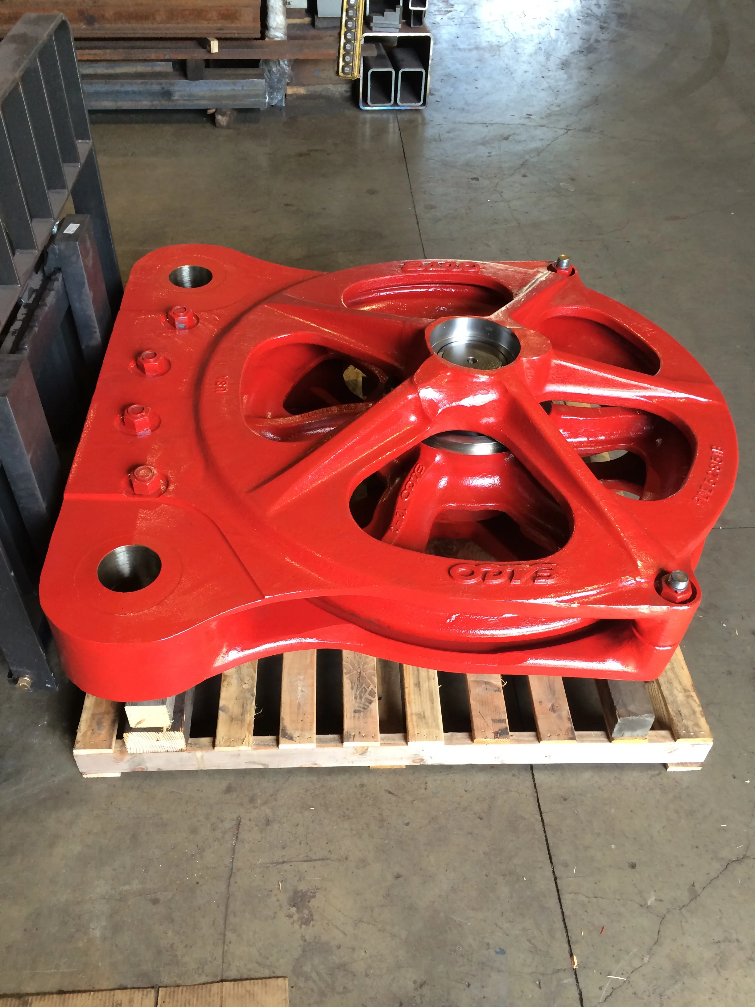 Large excavating shovel dump block machined from steel castings and fully assembled.