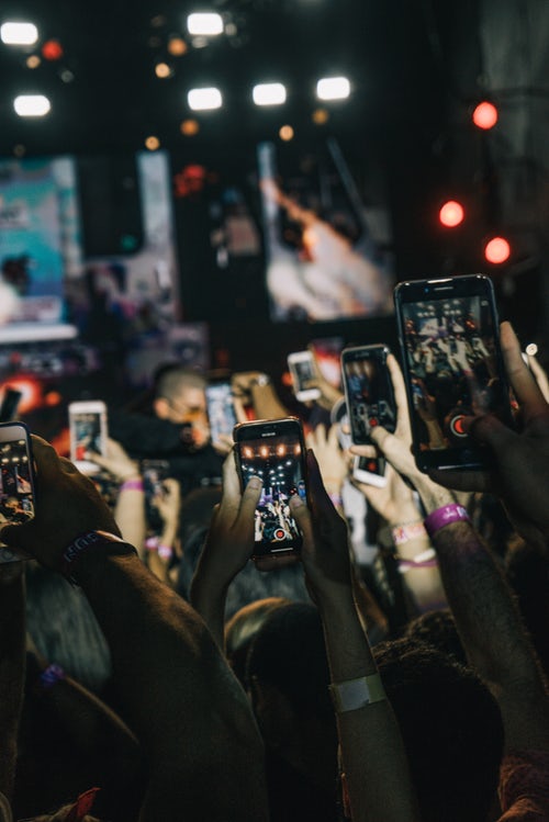 Instagram users at concert.jpg
