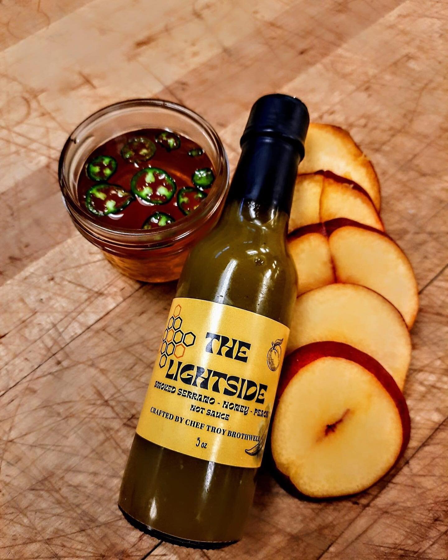 The second and last installment of @troy.brothwell limited edition hot sauce series. The Lightside is fermented smoked serrano and honey poached peaches. It's smokey sweetness with a 7/10 heat is a perfect balance to The Darkside hot sauce! We only h
