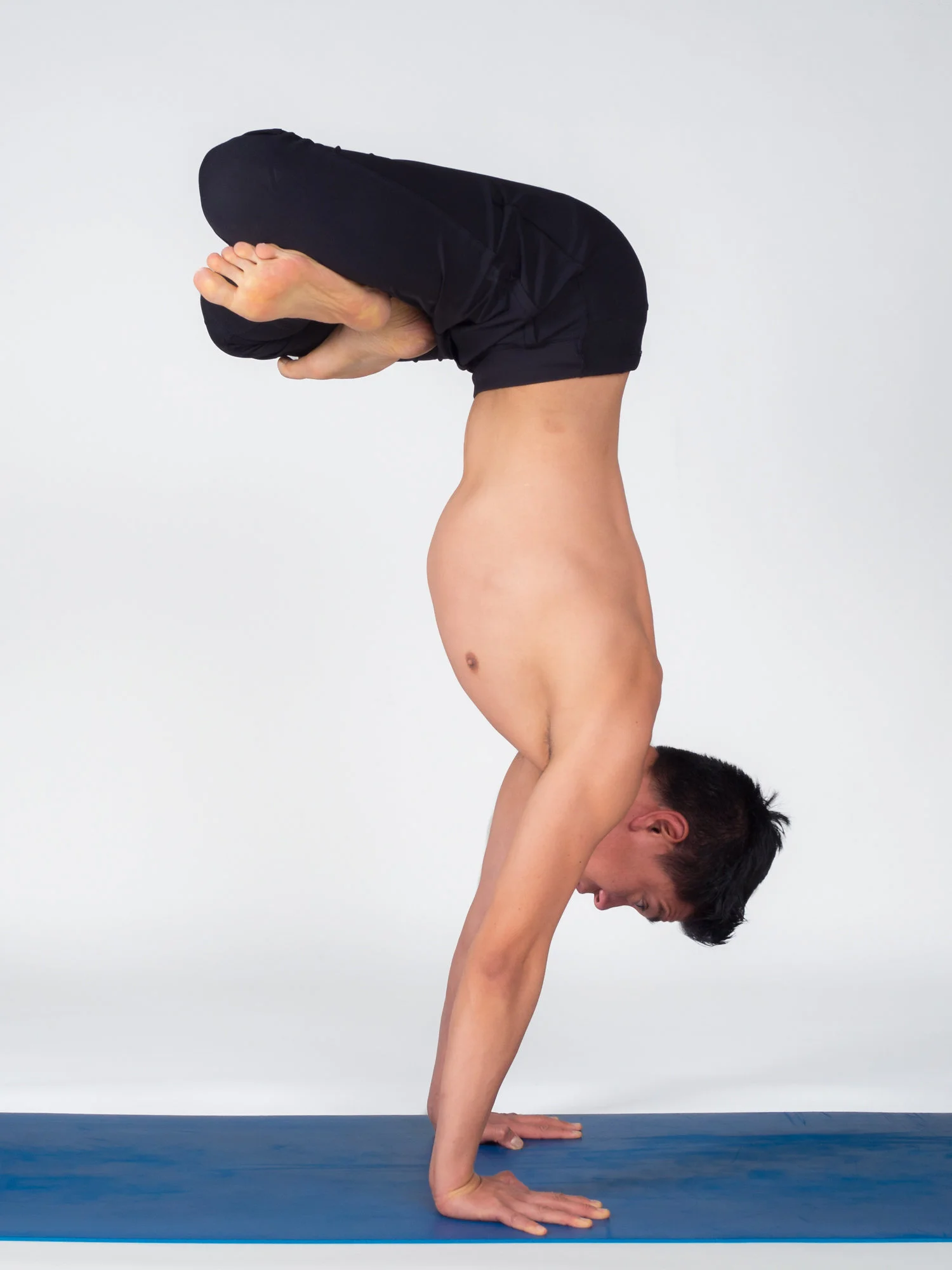 Andrew-Handstand Lotus.jpg