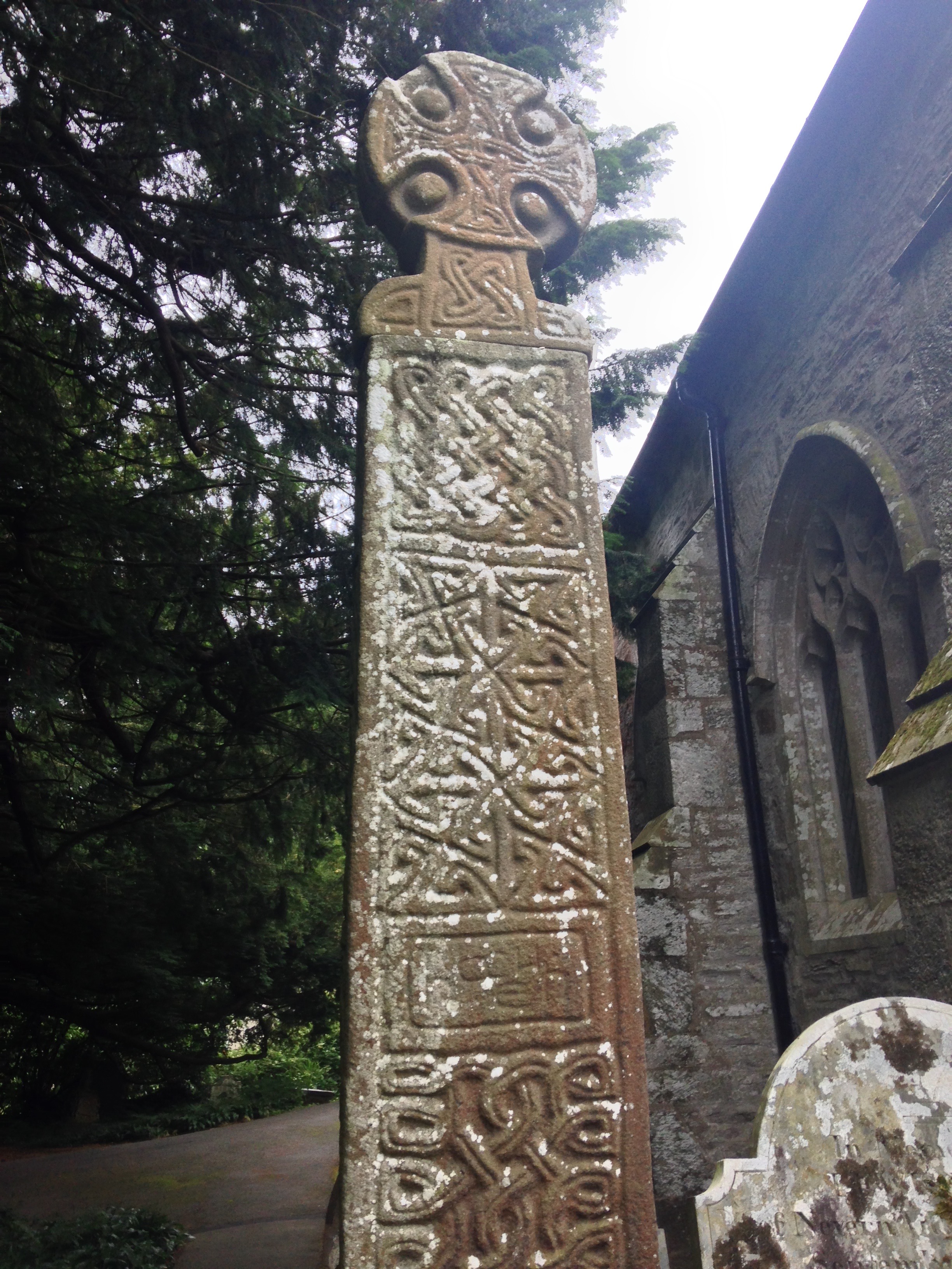 Nevern Cross from the 10th or 11th century. The current church next to it was built built during Norman times, on top of the church founded by St Brynach in the 6th century. The mysterious “Bleeding Yew” Tree in the churchyard is a holy site of the Welsh goddess Cerridwen.