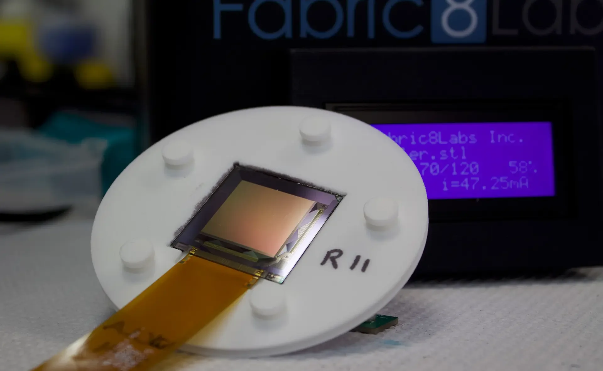 Fabric8Labs_-_TFT_Print_Head_0.webp