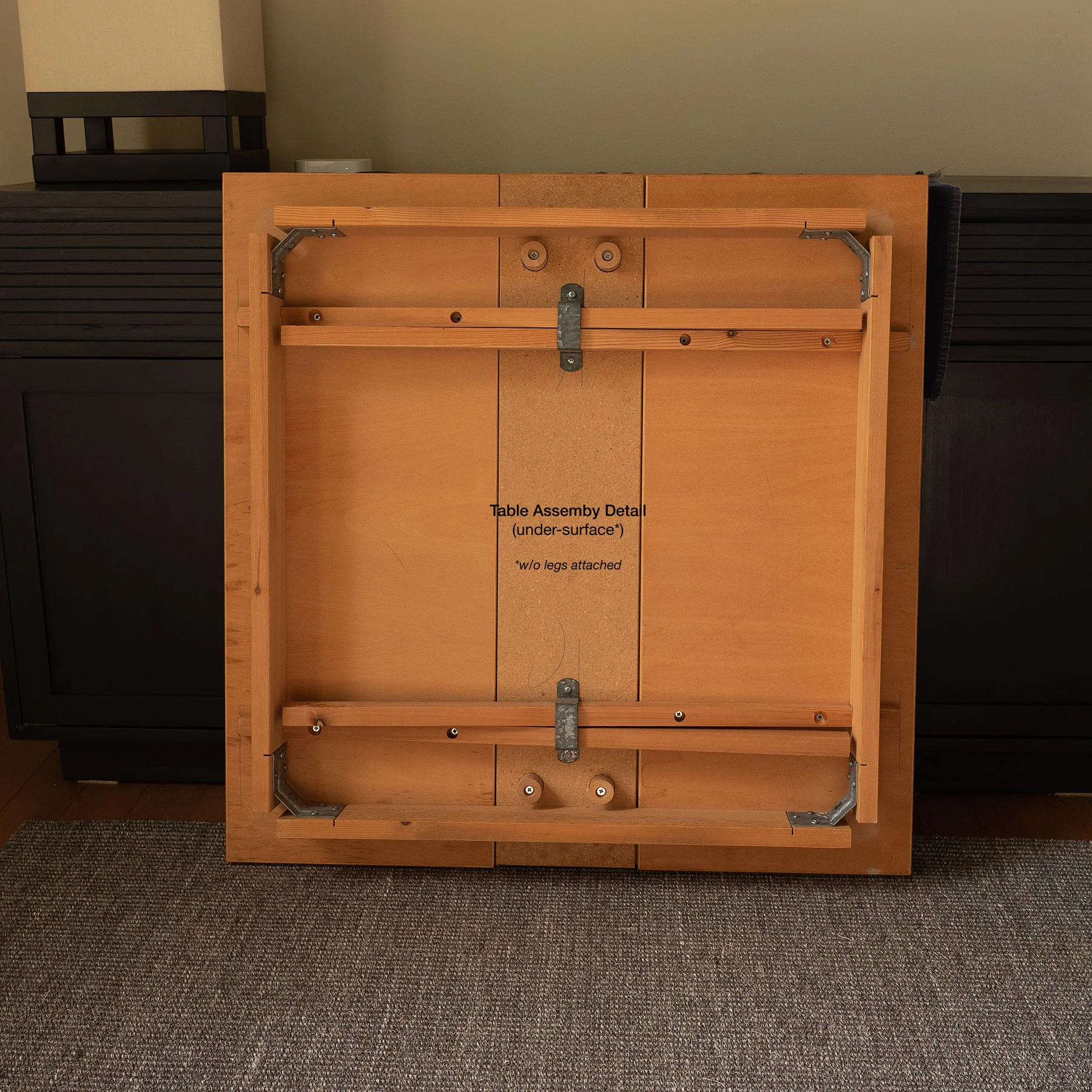 Underside of table top assembly: substructure; leaves; leaf rails; top-surface. (click to enlarge)