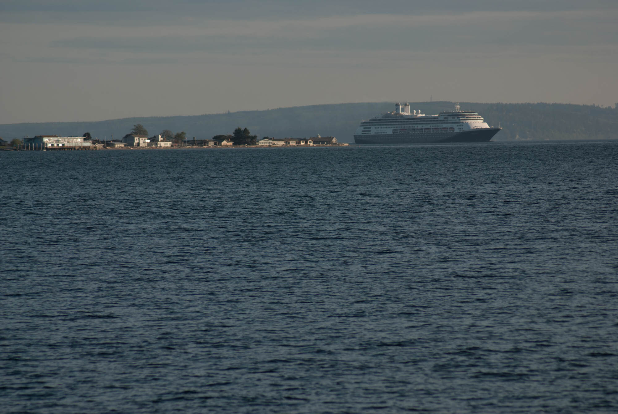 cruise ship rounding the point