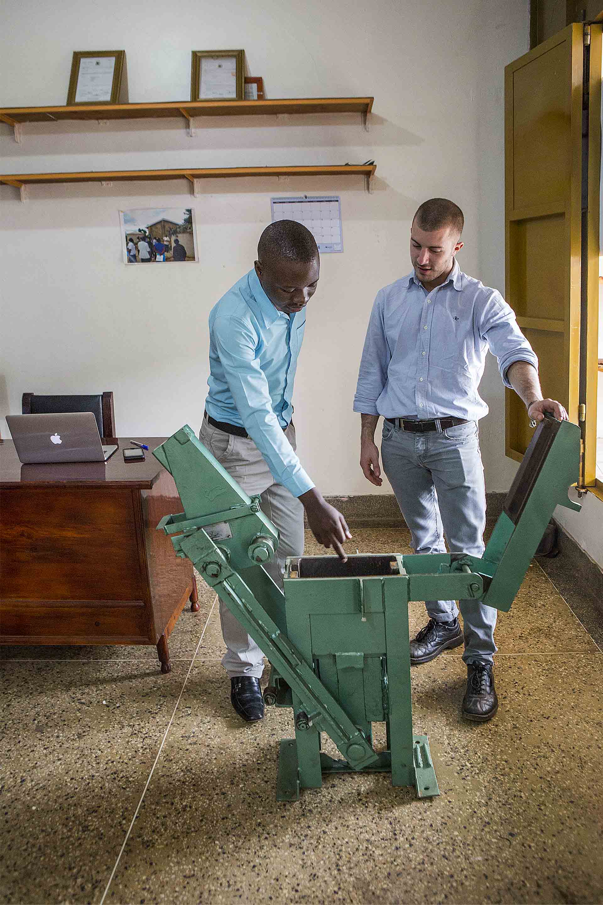  James Murduca and Construction Manager David Mutesaasira 