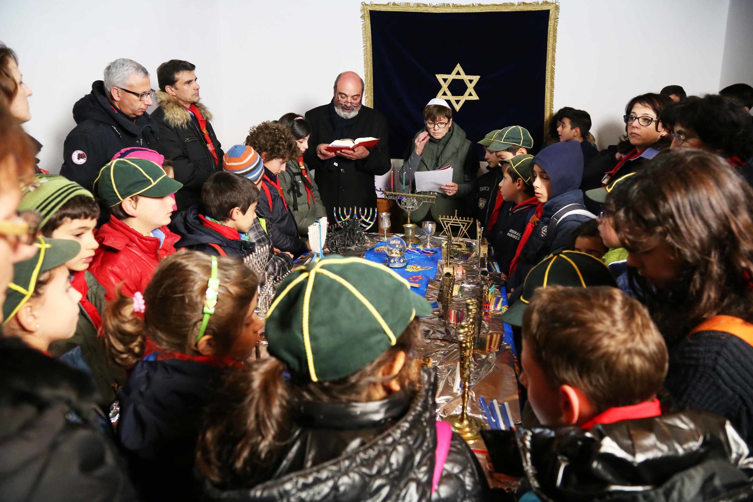 Don Gigi and Rabbi Aiello bless the Hannukiah together several years ago.
