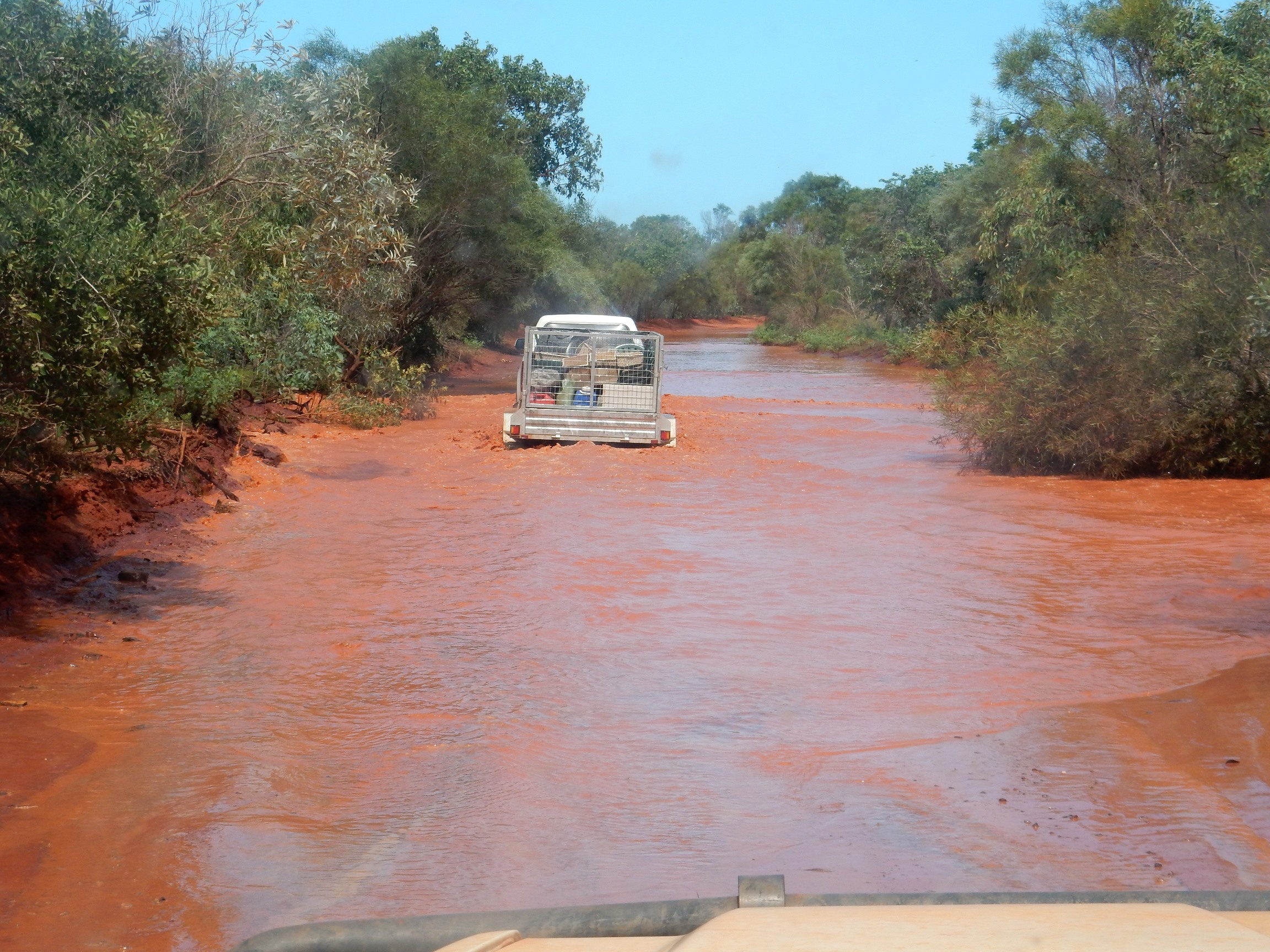 AWSG expedition battling floodwaters along Crab Creek Road. Photo: John Graff