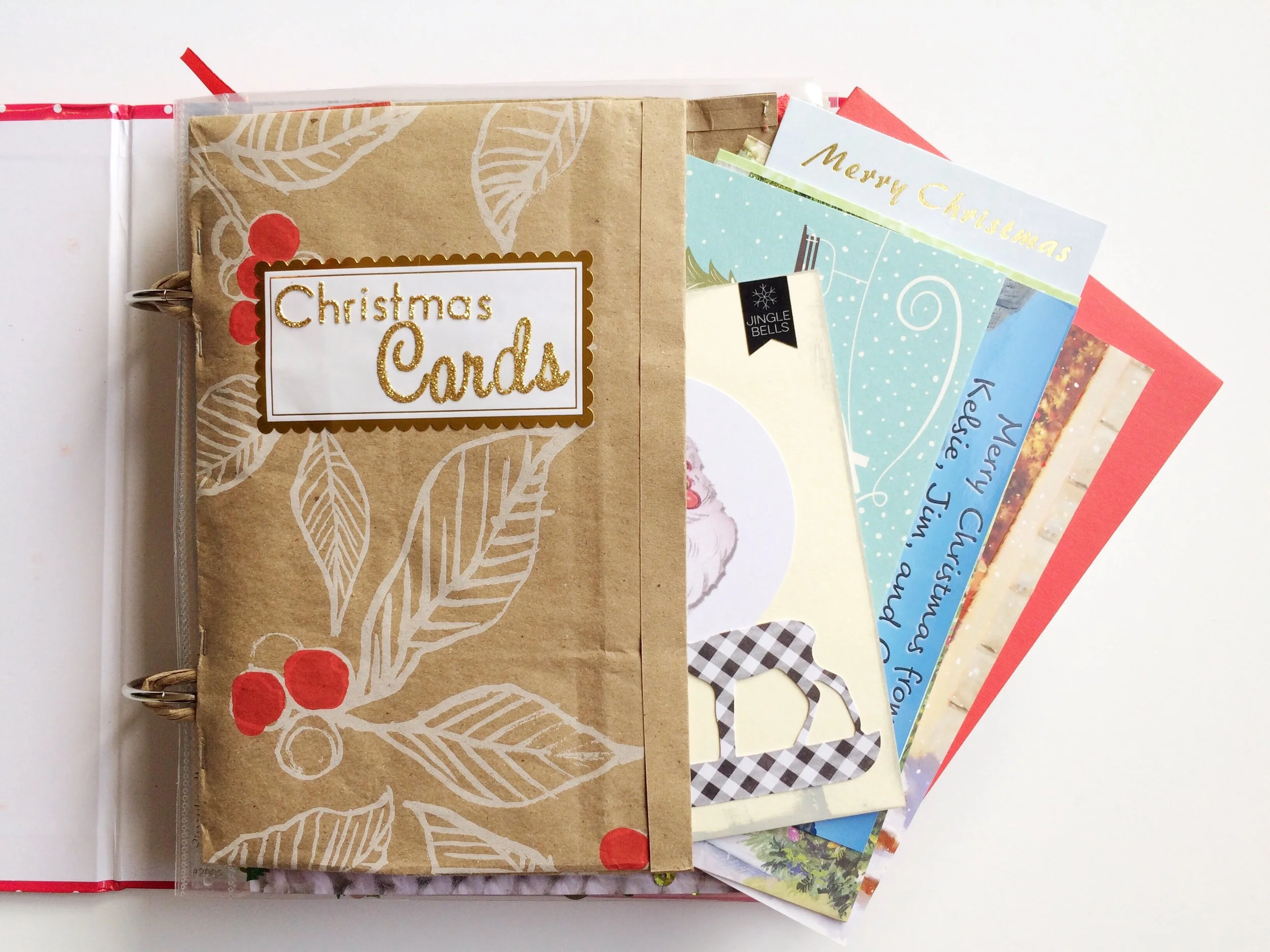The bag was mercifully the exact height of the largest card I wanted to include. It's still a pretty snug fit though, so I pared down the collection of cards I had to ones that included personal messages or had special attachments to. 