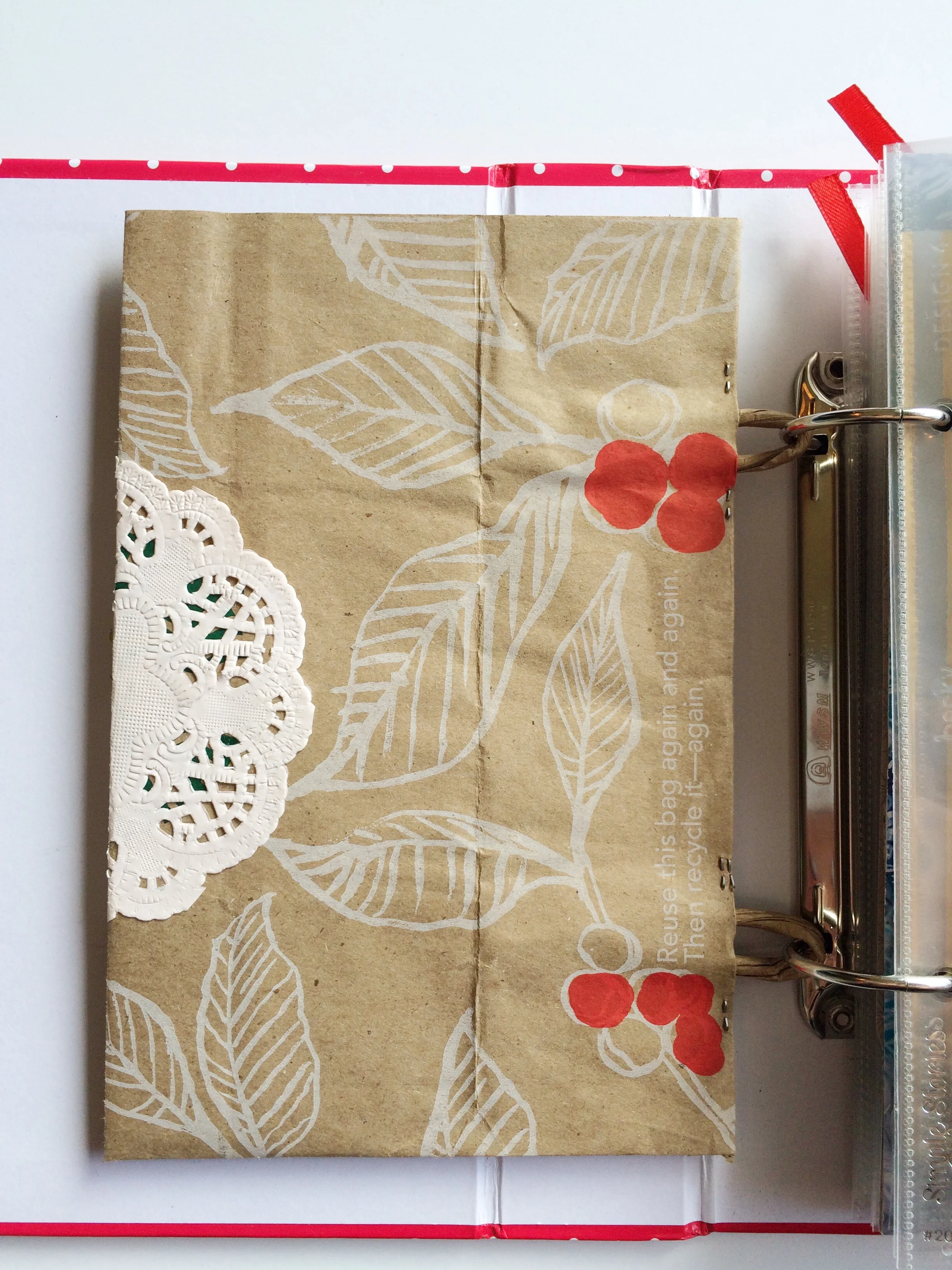 I love that the backside of the card pouch shows the "please reuse" message.