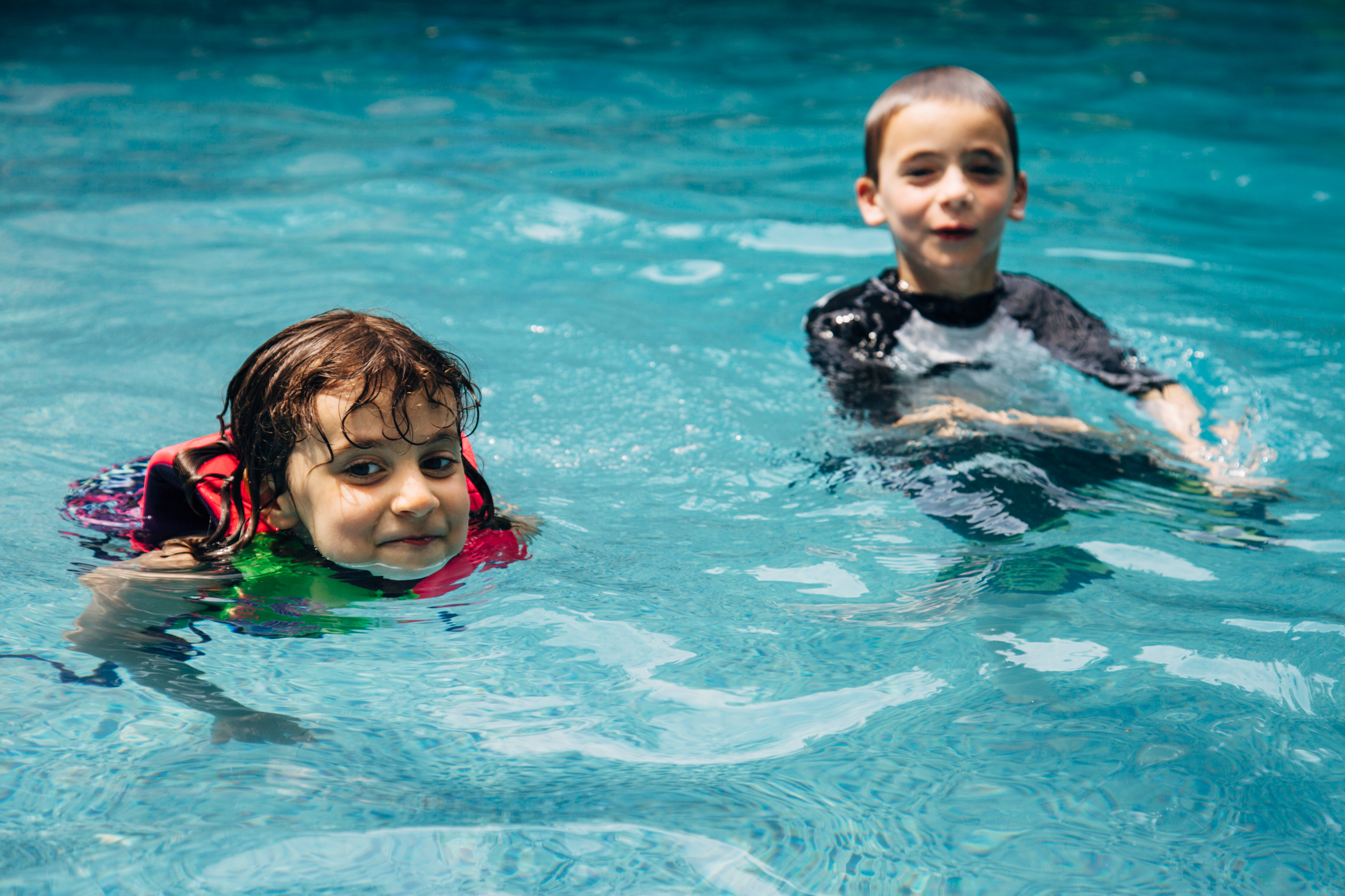 Chelsea and Jack having their first swim of the season.
