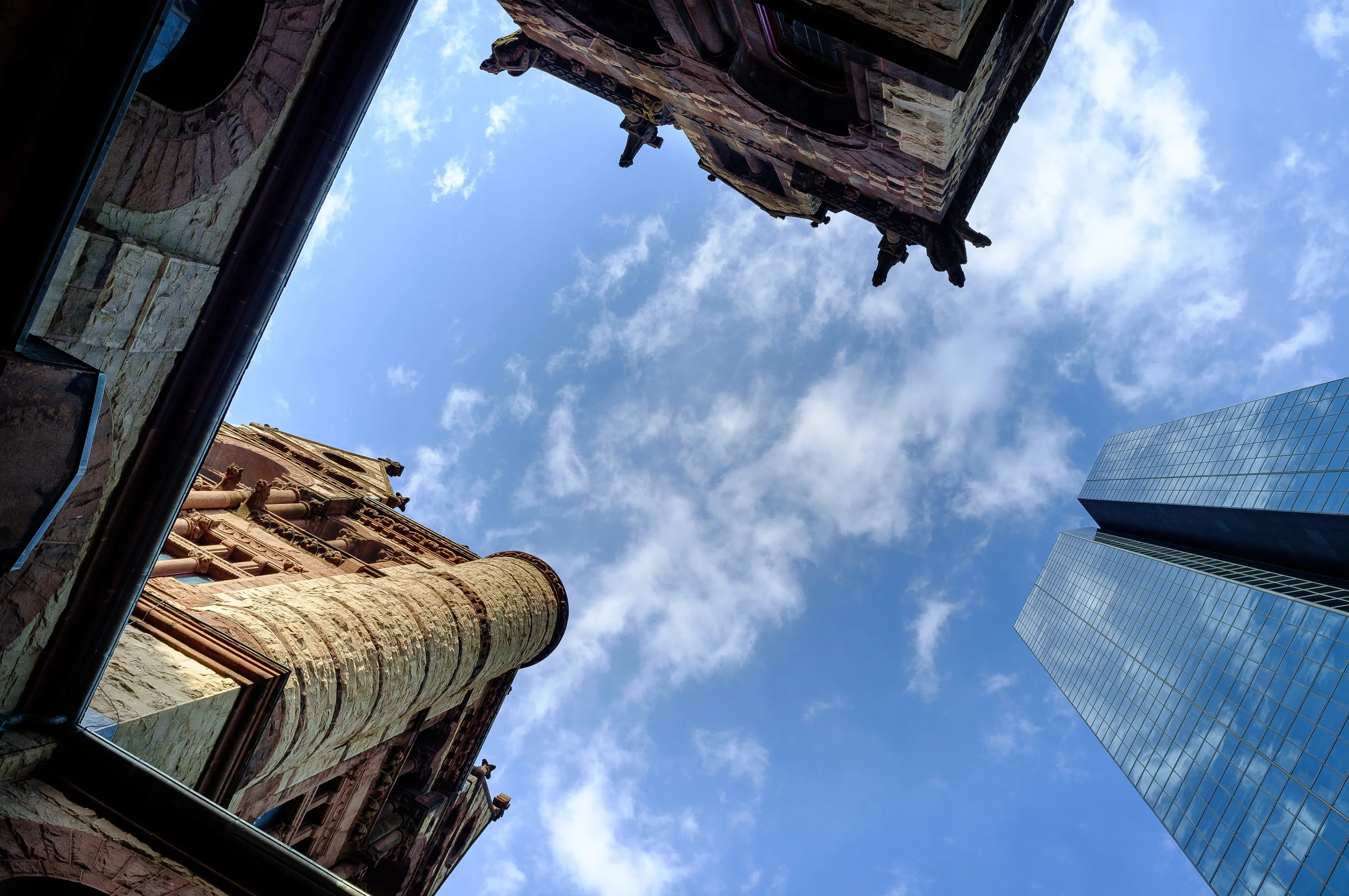 The Hancock building is about 4x taller than the Trinity Church.
