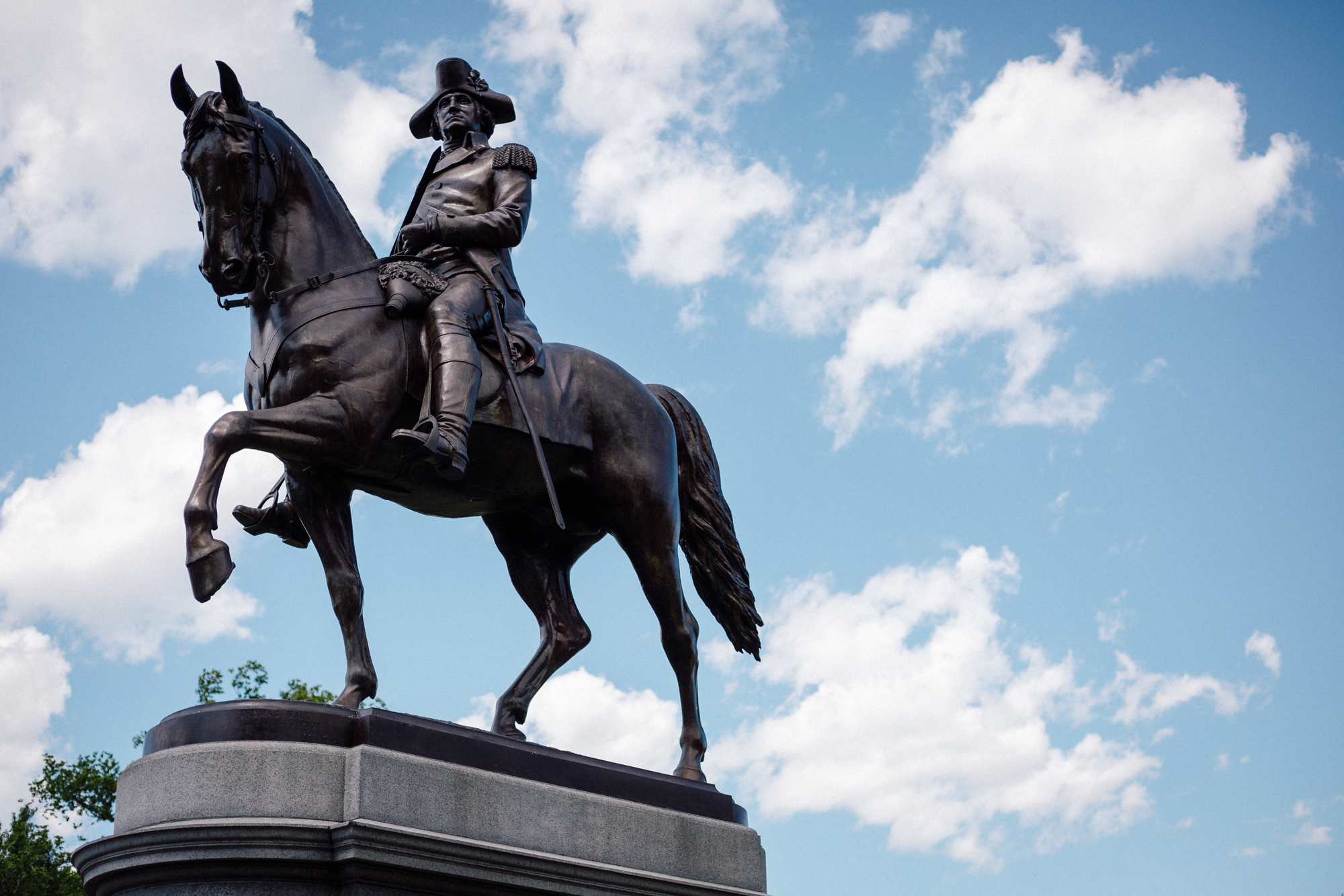 While shooting this statue of George Washington a guy by the name of Nick asked me if I would use his cell phone to take a picture of him doing a handstand in front of the statue. Of course I would! After I took the shot, I asked him if lost a bet or something. He let me know that he was doing this in honor of a friend of his who died (a bit of a long story). Nick was in the Navy and visiting Boston from Fresno CA. It was cool to strike up a conversation with him though. This is something that would have never happened if I'd been rushing through the garden like I usually do. 