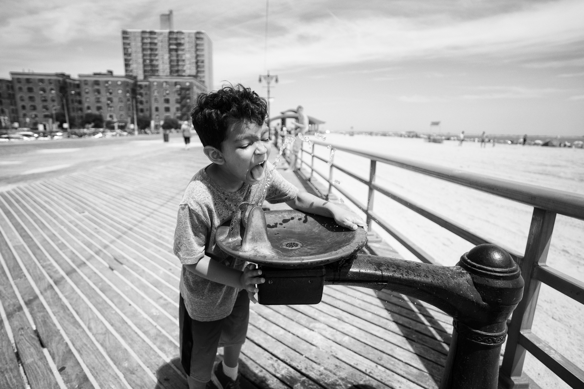(Sony ILCE-7RM2 + Zeiss Batis 18mm f/2.8) ISO 100 - It was hot! A quick snap of my son getting some water, I was impressed with the details when viewing this shot at home.