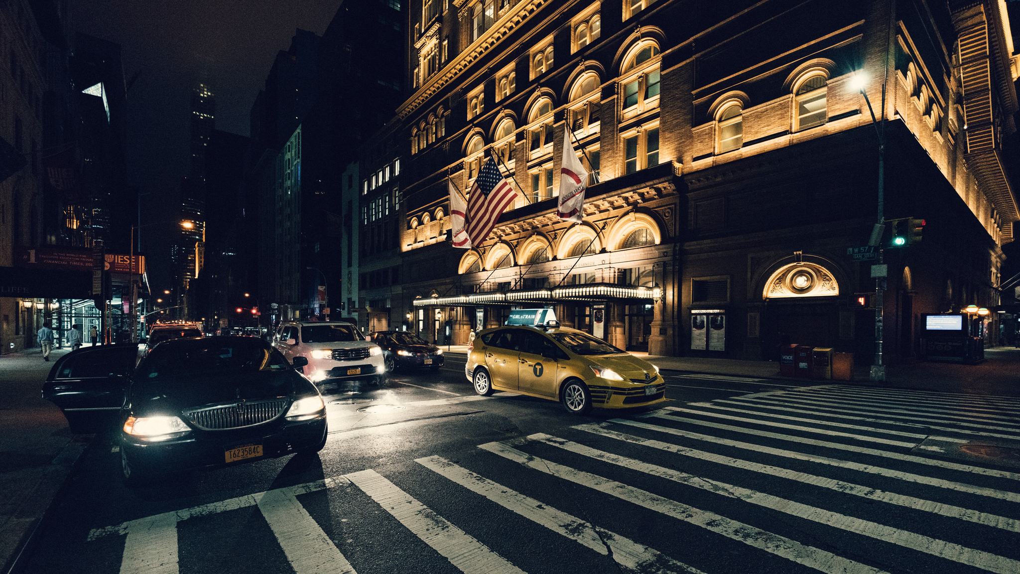 Sony A7Rii + Voigtlander SUPER WIDE-HELIAR 15mm F4.5 III - ISO 6400 1/125 - Carnegie Hall in the background. Using the 15mm to create one of my classic street scenes.
