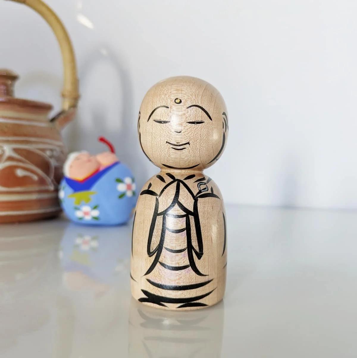 Petit jizo en érable - yeux clos