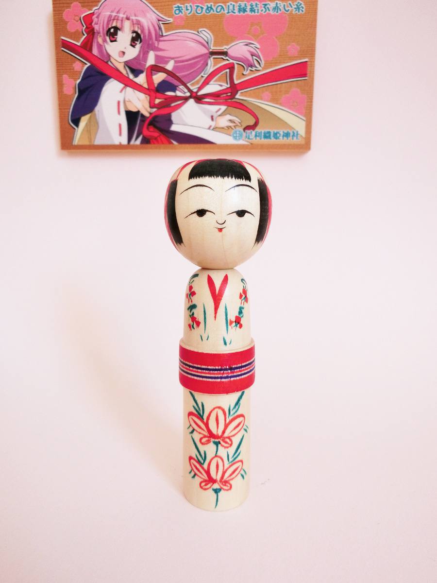 Red obi kokeshi girl by craftsman Kanou Hiroshi
