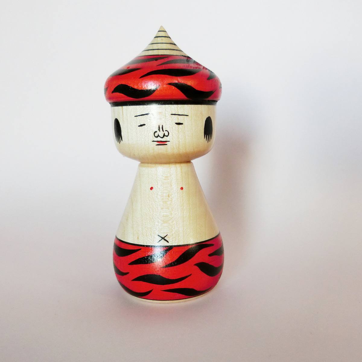 Oni-chan kokeshi doll in red