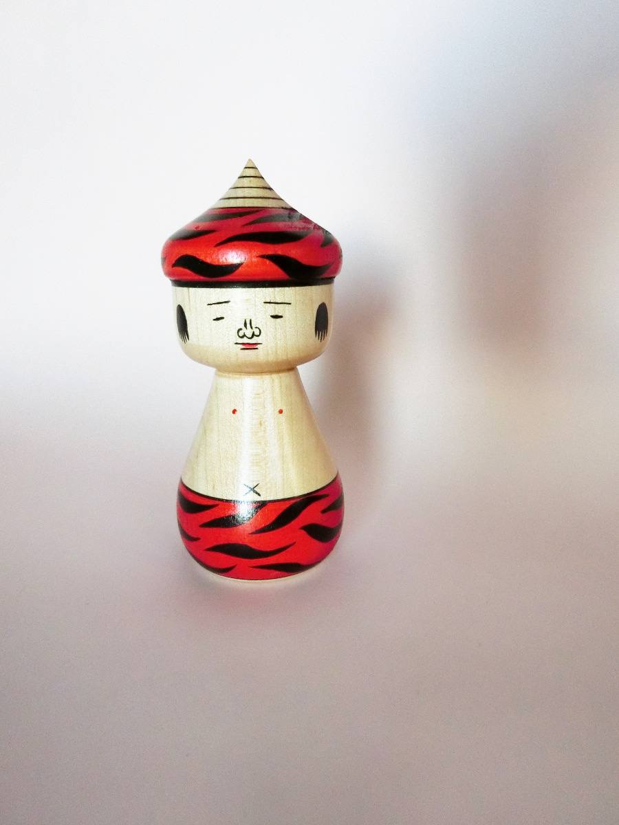 Oni-chan kokeshi doll in red