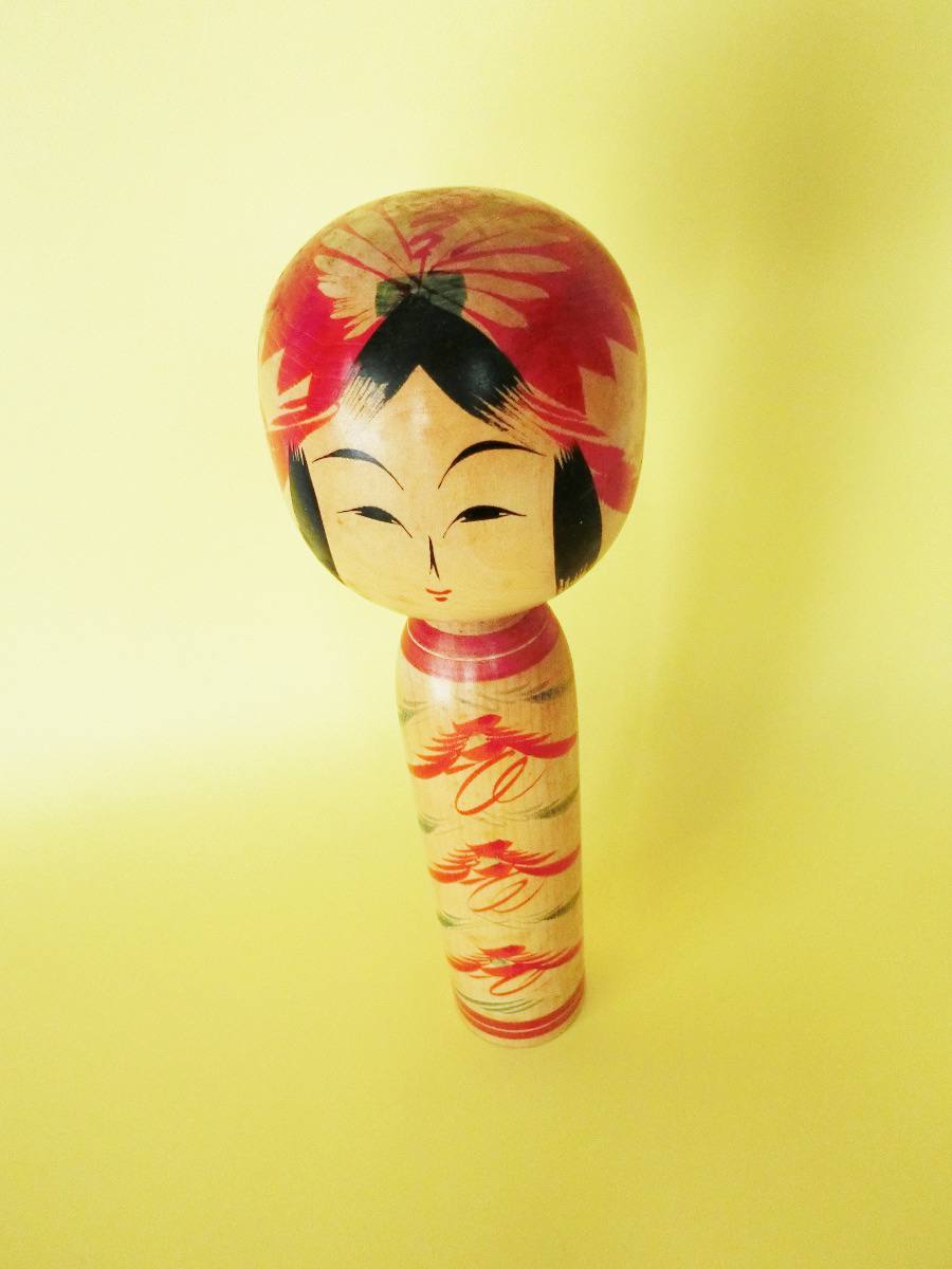 Vintage kokeshi doll in Togatta style