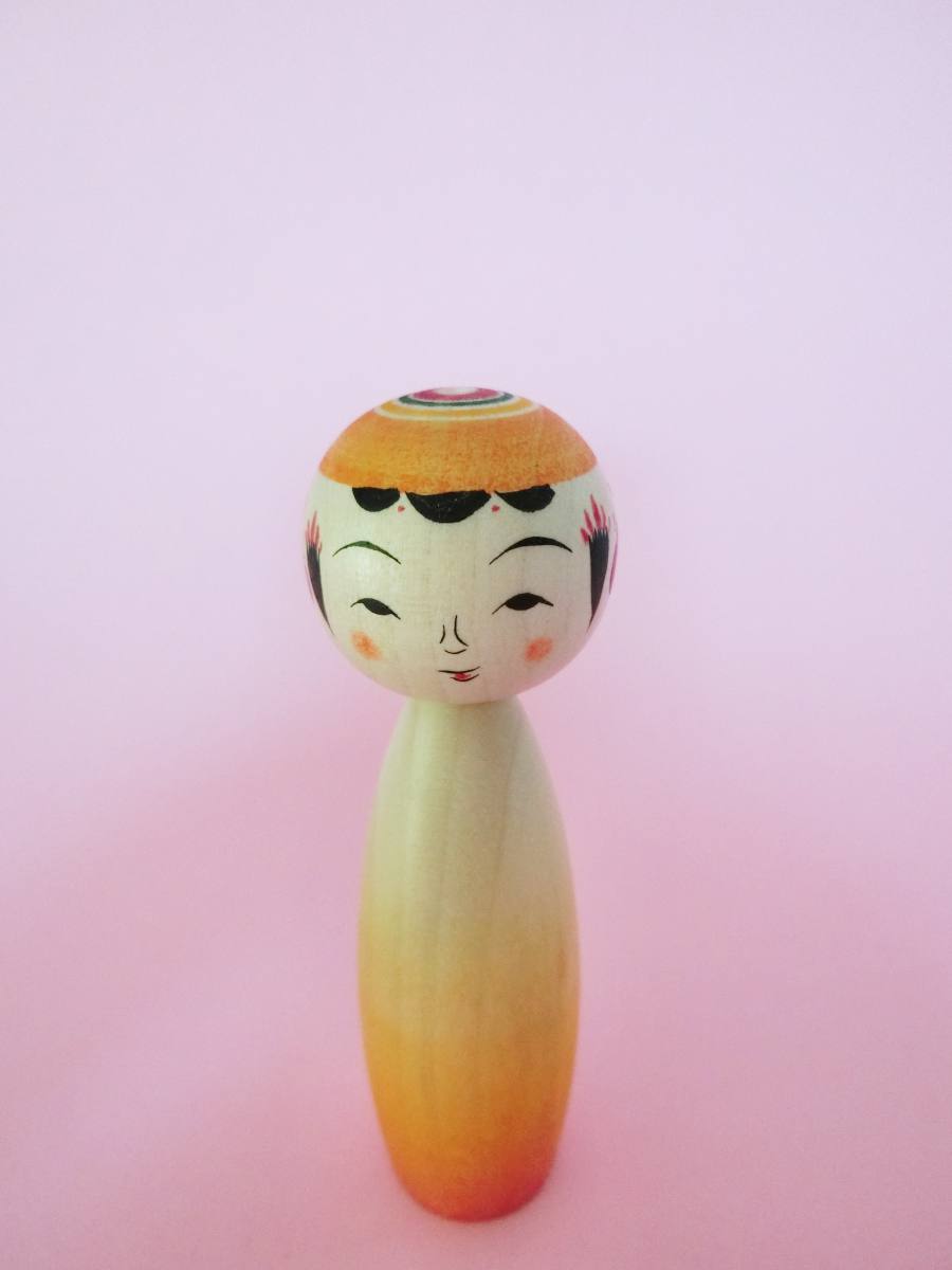 Ombré kokeshi doll by Sato Yusuke (orange)