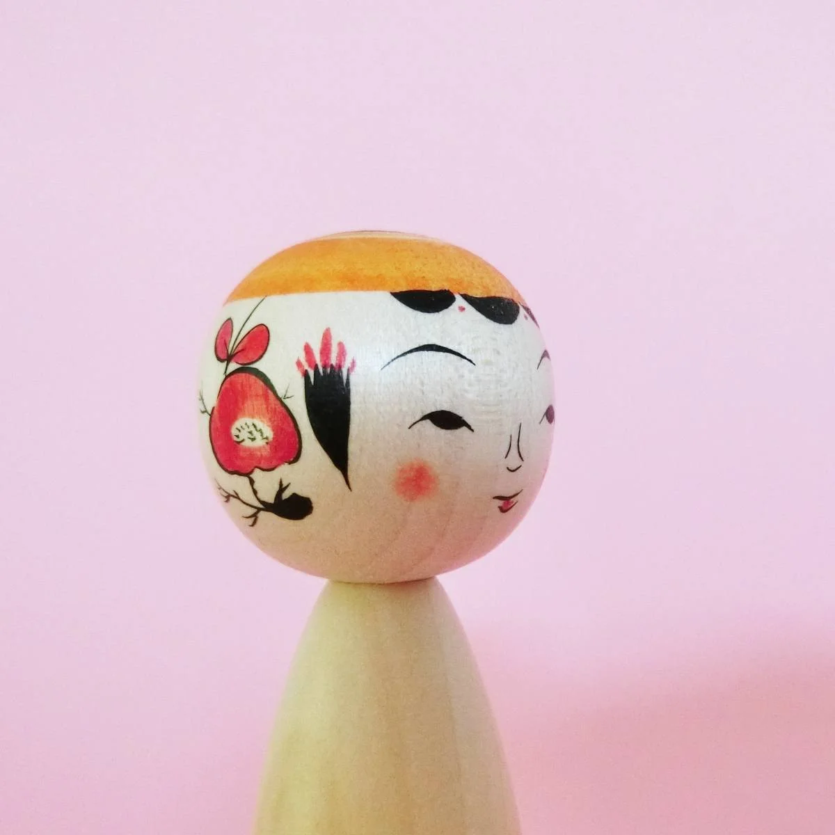 Ombré kokeshi doll by Sato Yusuke (orange)