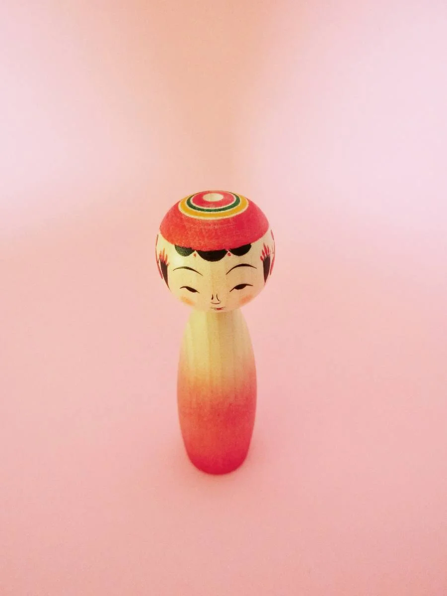 Ombré kokeshi doll by Sato Yusuke (pink)