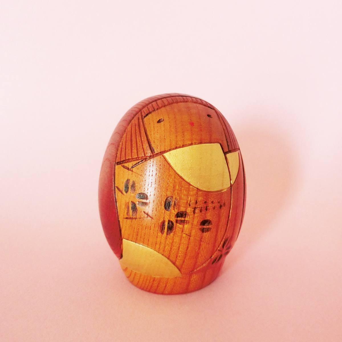 Creative kokeshi doll with many details
