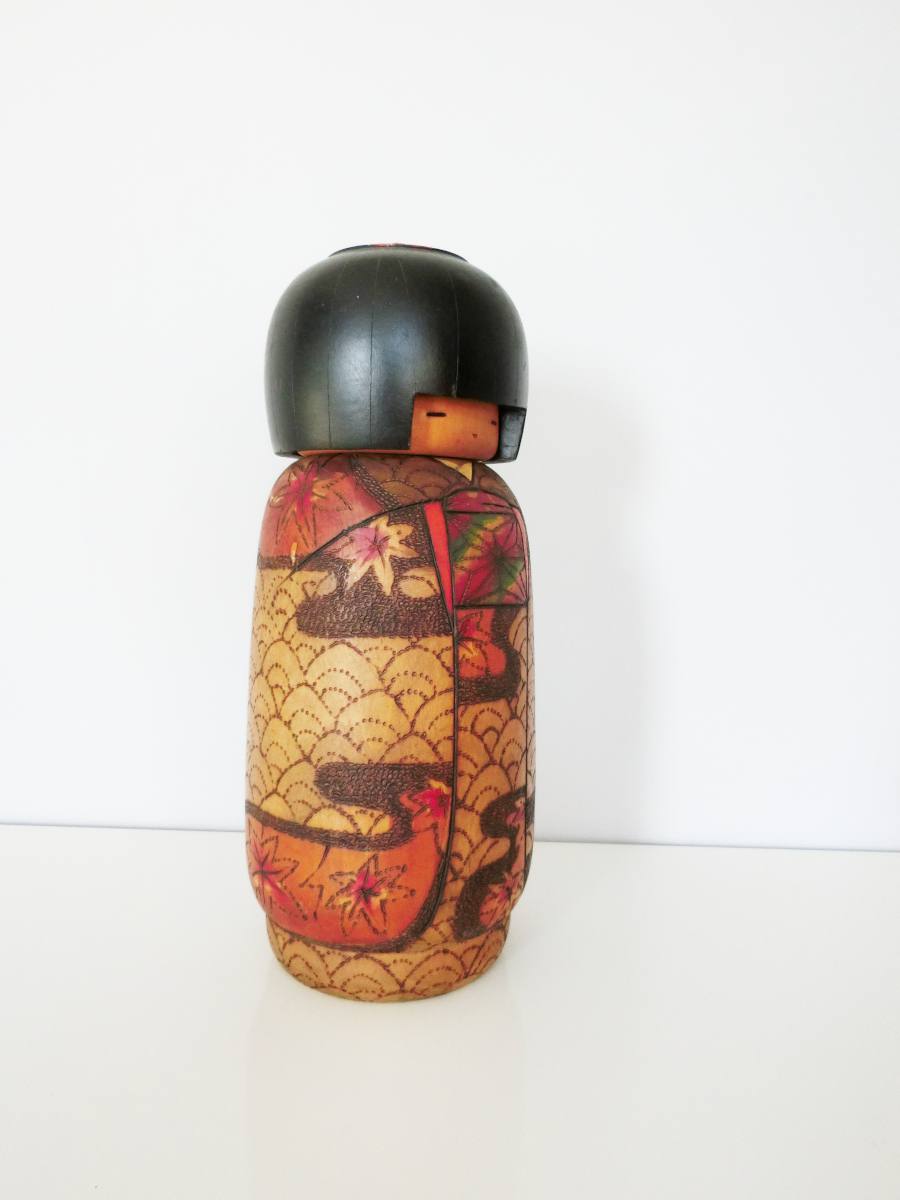 Intricate kokeshi doll by Kobayashi Inosuke