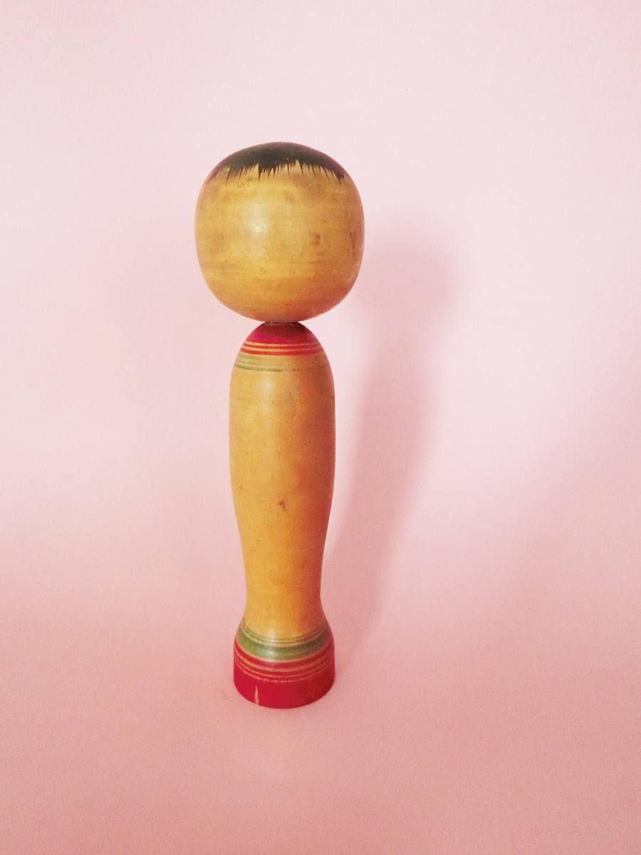 Roses kokeshi doll by Ishiyama Sanshiro