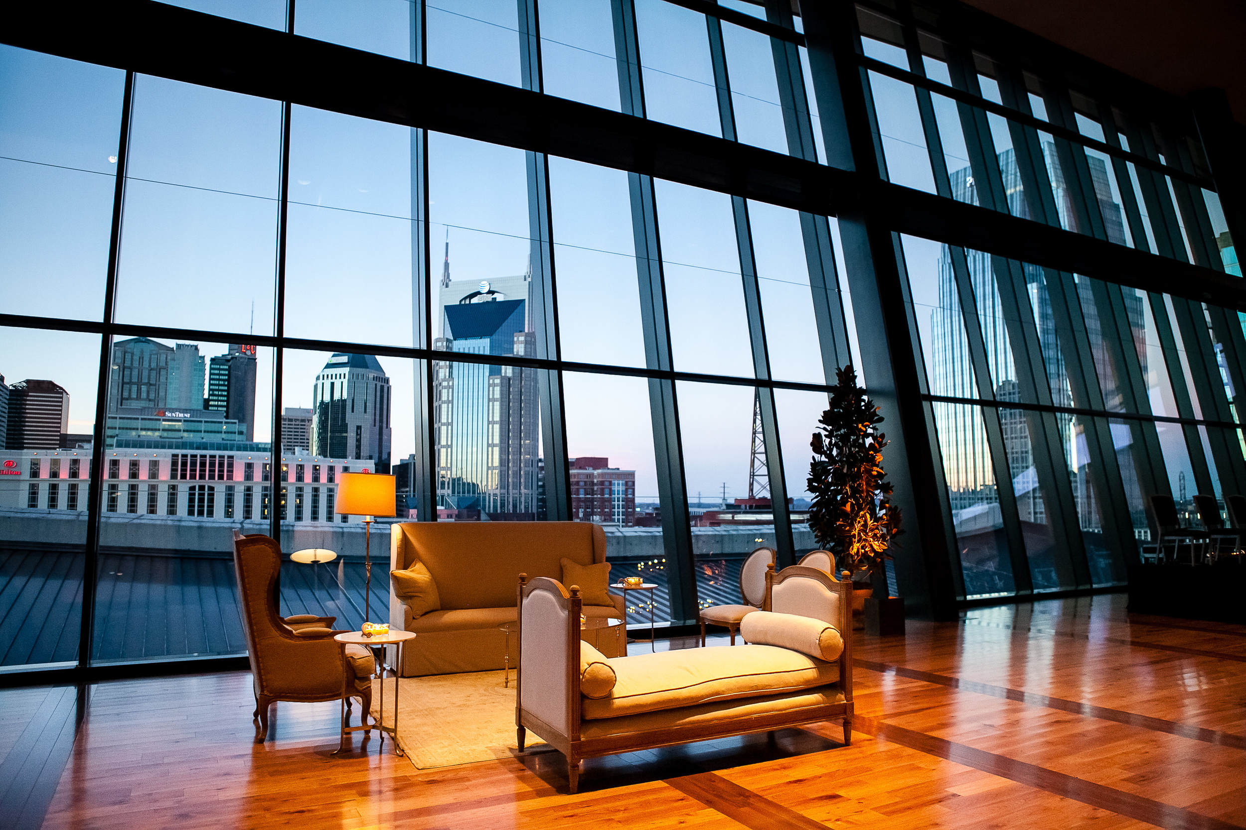 fetenashville.com | Country Music Hall of Fame Wedding | Luxury Nashville Wedding Planner | Fete Nashville Event Design | Baseball Player Justin Timothy Miller Gets Married | best wedding planner nashville | Titan's Coach Jeff Fisher's daughter gets married | antler chandeliers | gold and ivory wedding | white wedding cake | Nashville skyline view wedding | gold and ivory wedding invitations | gold calligraphy 