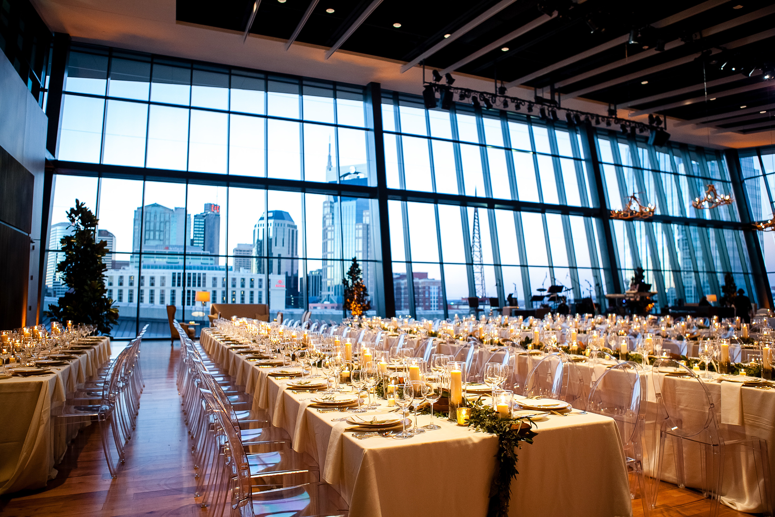 fetenashville.com | Country Music Hall of Fame Wedding | Luxury Nashville Wedding Planner | Fete Nashville Event Design | Baseball Player Justin Timothy Miller Gets Married | best wedding planner nashville | Titan's Coach Jeff Fisher's daughter gets married | antler chandeliers | gold and ivory wedding | white wedding cake | Nashville skyline view wedding | gold and ivory wedding invitations | gold calligraphy 