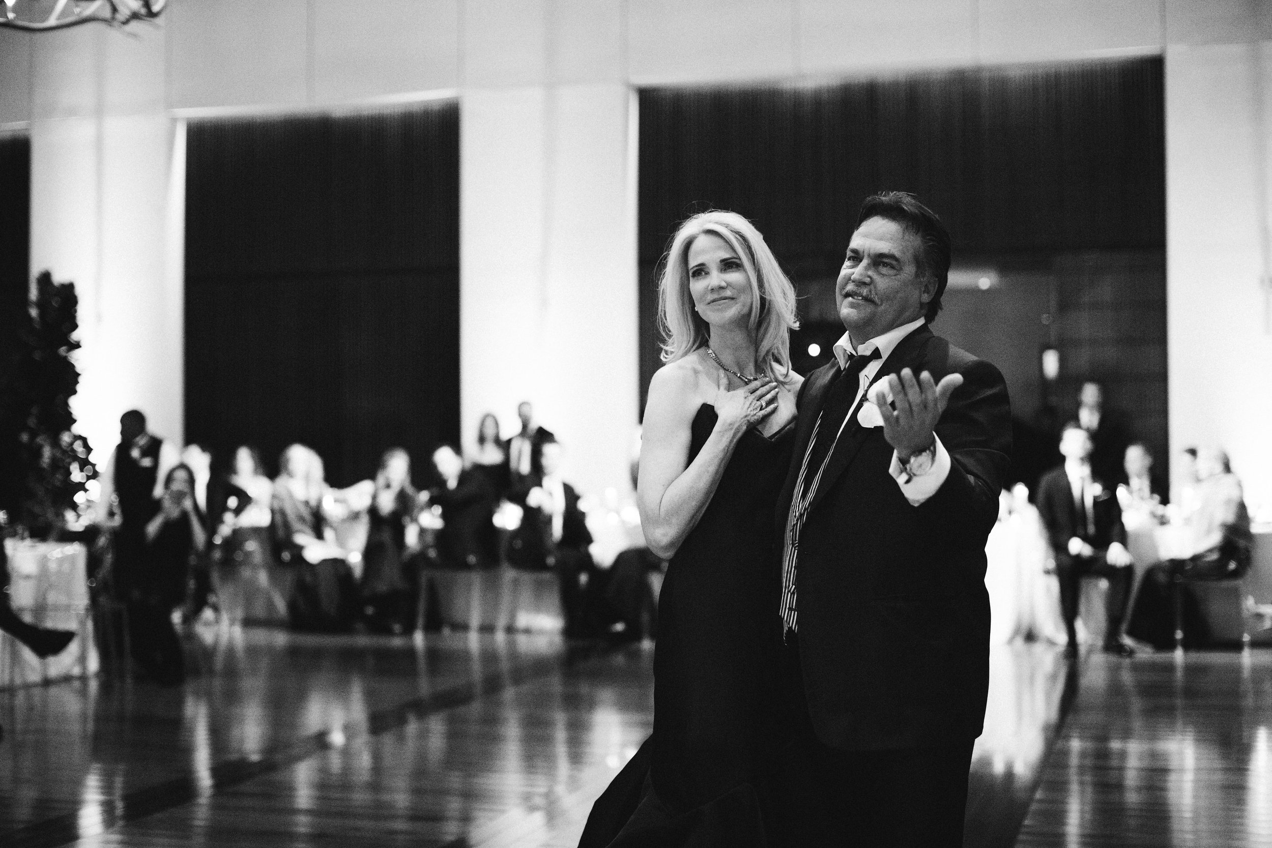 fetenashville.com | Country Music Hall of Fame Wedding | Luxury Nashville Wedding Planner | Fete Nashville Event Design | Baseball Player Justin Timothy Miller Gets Married | best wedding planner nashville | Titan's Coach Jeff Fisher's daughter gets married | antler chandeliers | gold and ivory wedding | white wedding cake | Nashville skyline view wedding | gold and ivory wedding invitations | gold calligraphy | Rascal Flatts plays at wedding