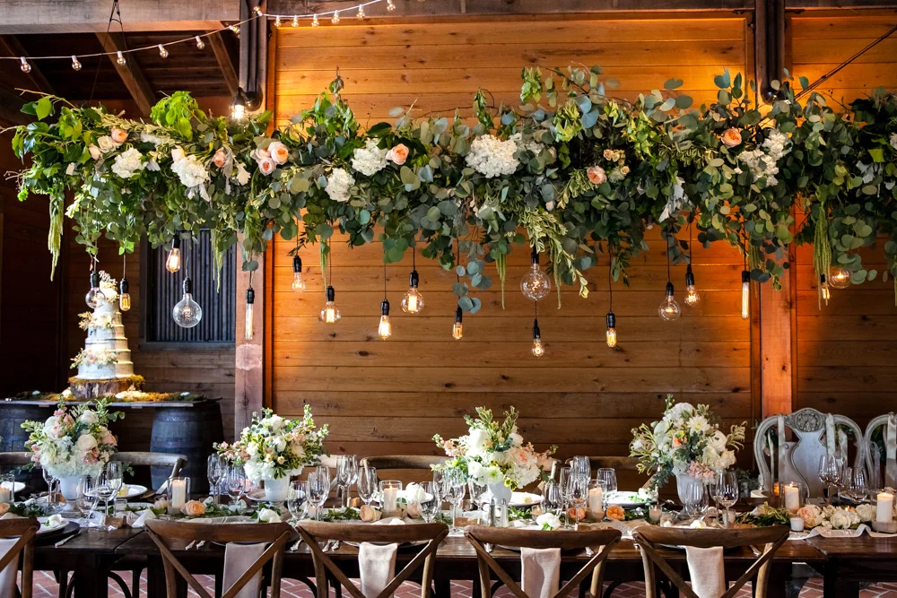 fetenashville.com | Franklin Wedding at Trinity View Farm | Shawn Johnson Gets Married to Andrew East | Fete Nashville Wedding Planning and Design | best wedding planner | nashville best wedding planner | Luxury Weddings | Celebrity Wedding Planner | exposed bulbs | wedding cake