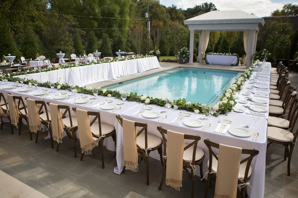fetenashville.com | Luxury Wedding Planning and Design by Fete Nashville | TK Kimbrell marries Laura Covington | Toby Keith's manager | Private Residence Wedding Planner in Nashville | best wedding planner nashville | celebrity wedding planner | backyard wedding | outdoor ceremony | outdoor reception | dinner around the pool | ivory and green wedding | peony bouquet | TKO artist | Photographed by Amber Davis Smith | nashville wedding | head table with garland