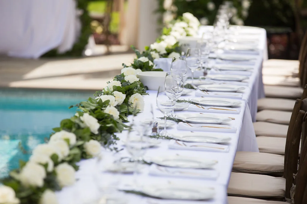 fetenashville.com | Luxury Wedding Planning and Design by Fete Nashville | TK Kimbrell marries Laura Covington | Toby Keith's manager | Private Residence Wedding Planner in Nashville | best wedding planner nashville | celebrity wedding planner | backyard wedding | outdoor ceremony | outdoor reception | dinner around the pool | ivory and green wedding | peony bouquet | TKO artist | Photographed by Amber Davis Smith | nashville wedding | head table with garland