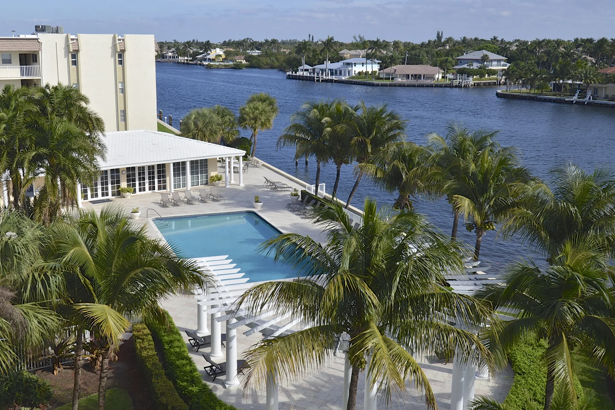 The pool, outdoor kitchen and clubhouse — right on the Intracoastal