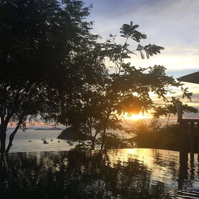 Flores, Indonesia - dishing out one of its arsenal of sunset vistas. The perfect cold beer backdrop.